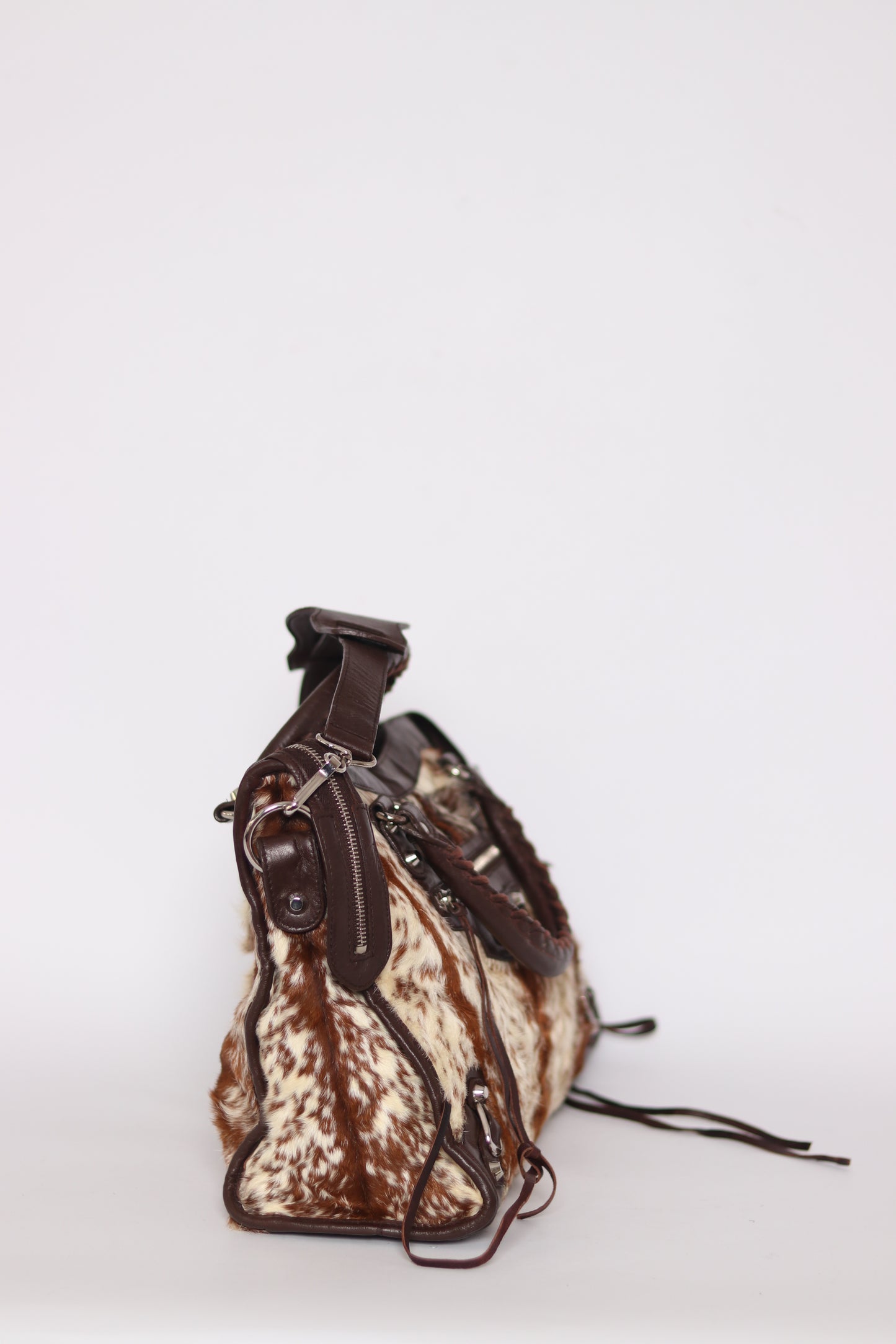 BALENCIAGA
Brown/White Pony Hair Motorcycle City Bag