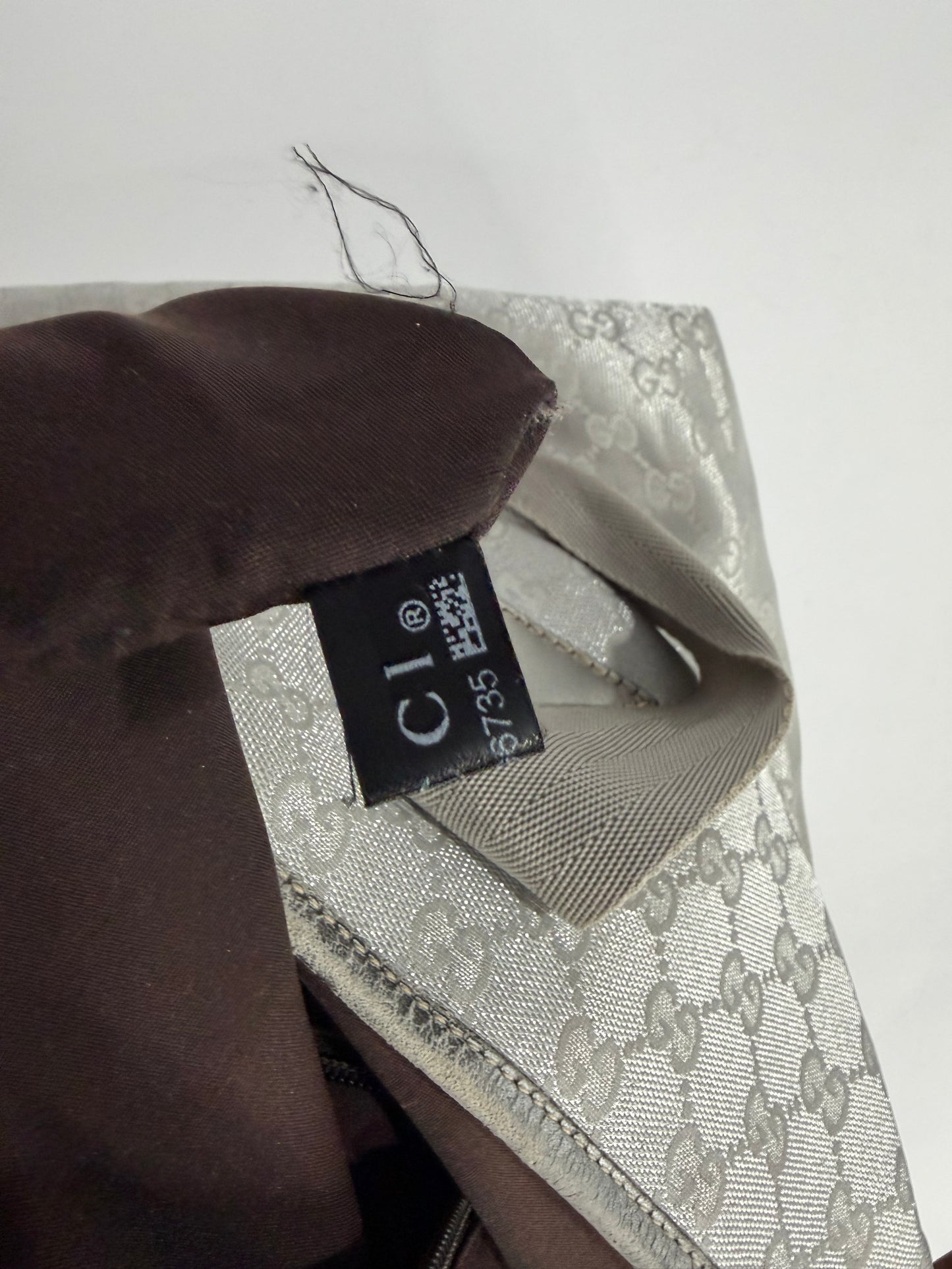 GUCCI
Metallic Silver GG Canvas Travel Tote