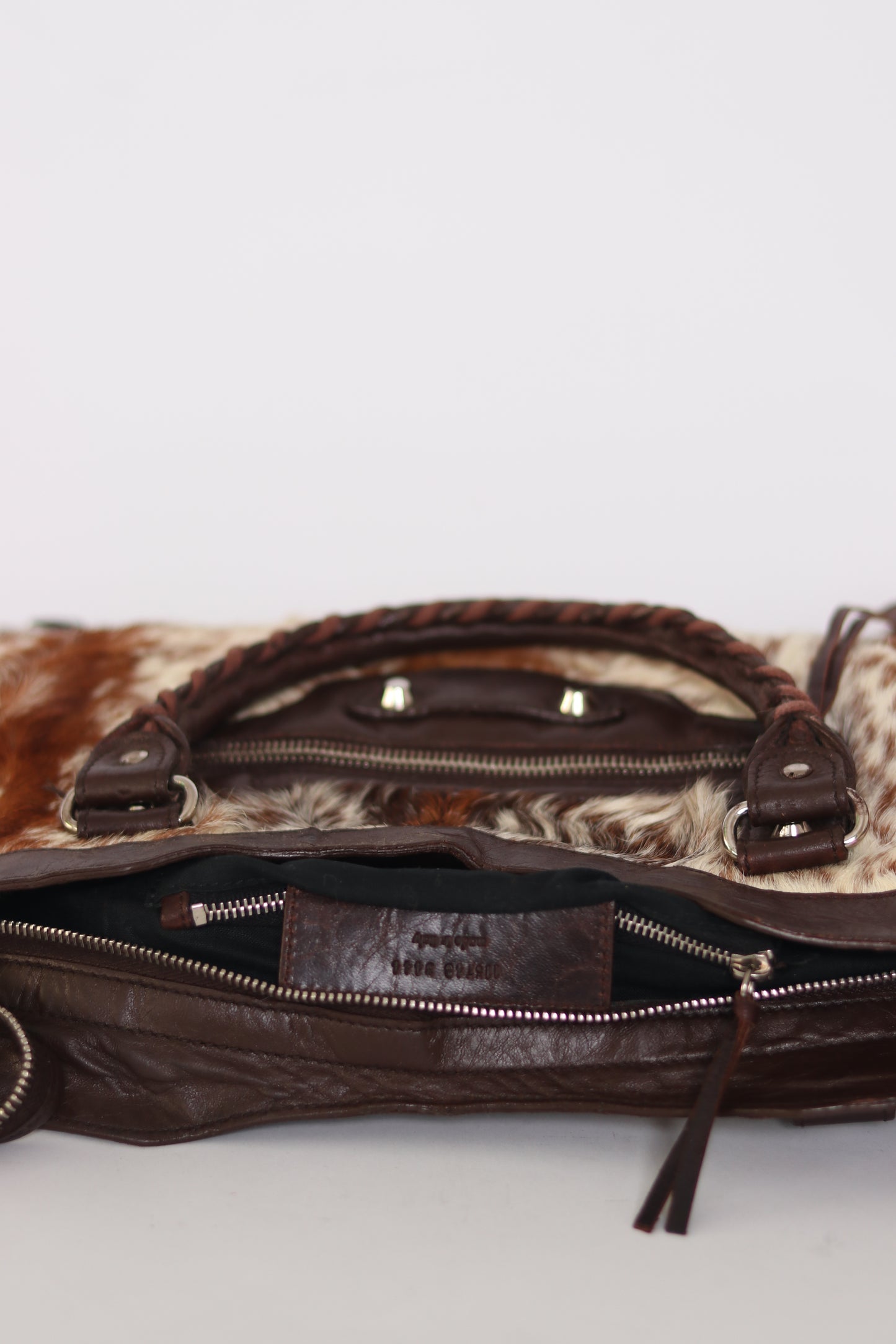 BALENCIAGA
Brown/White Pony Hair Motorcycle City Bag
