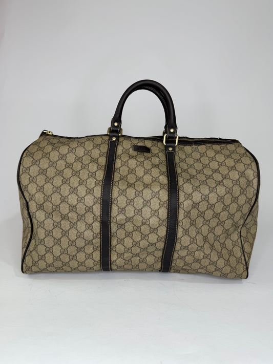 GUCCI
GG Plus Monogram Large Carry On Duffle Bag Brown