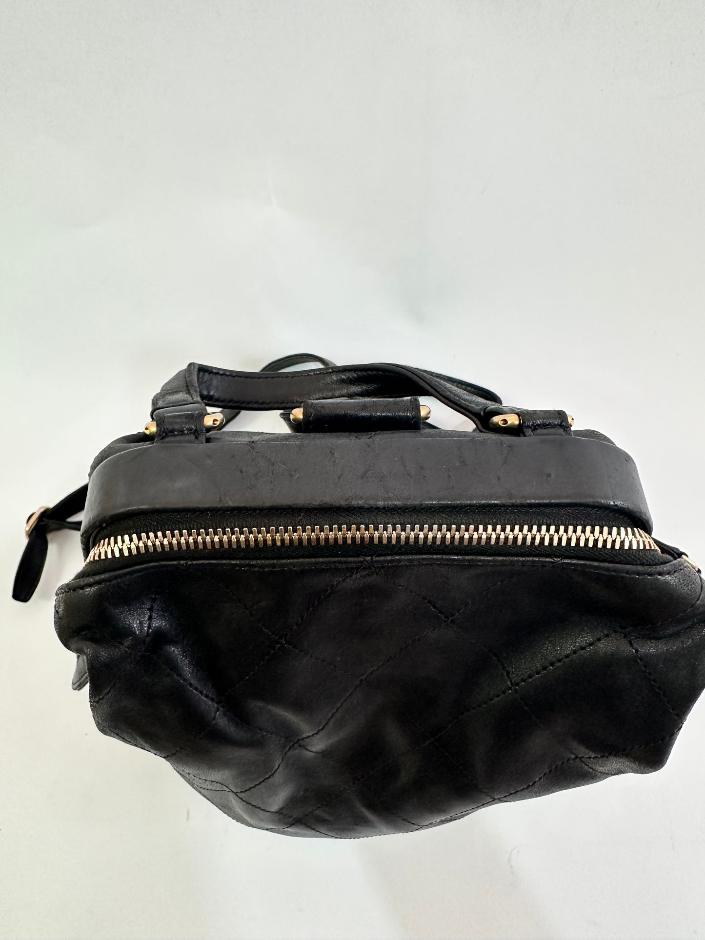 CHANEL
CC Diamond Quilted Backpack Black