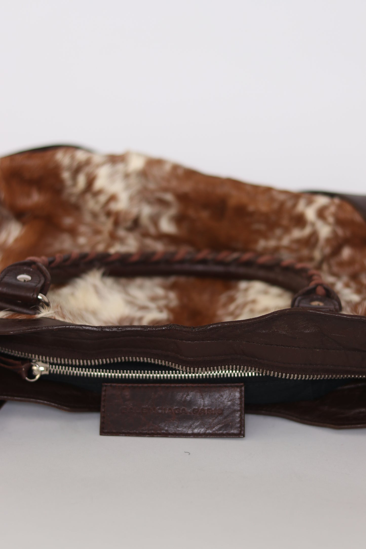 BALENCIAGA
Brown/White Pony Hair Motorcycle City Bag