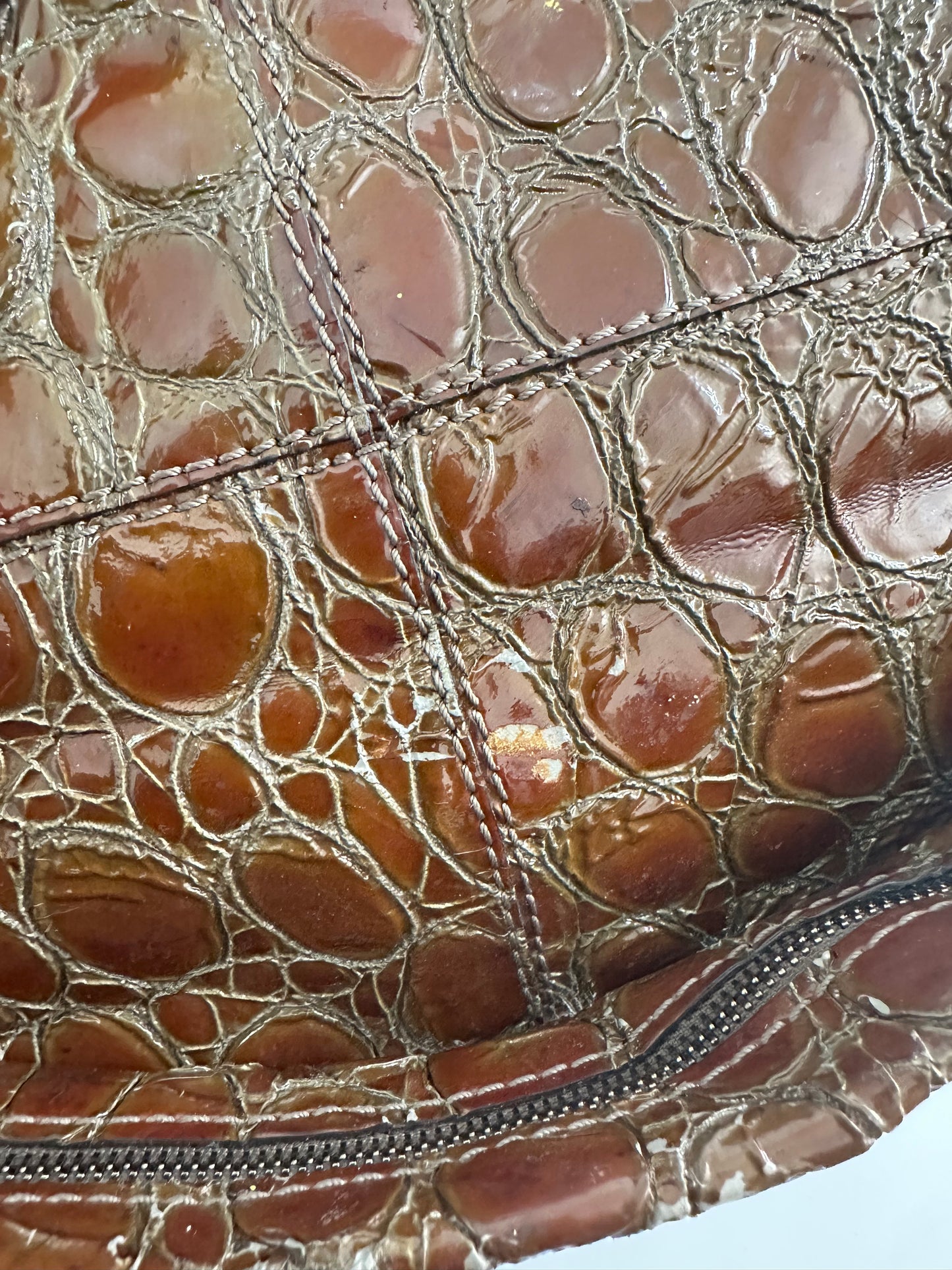 GIVENCHY
Brown Croc-Embossed Patent Leather Medium Nightingale Bag