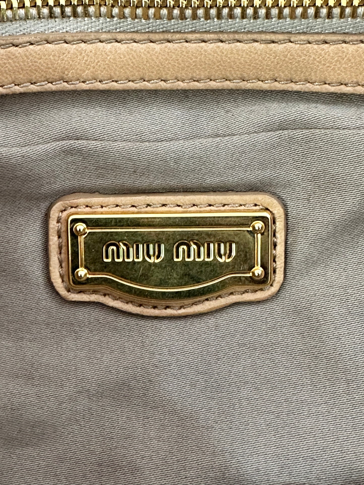 Miu Miu Beige Matelasse Leather Turnlock Top Handle Bag