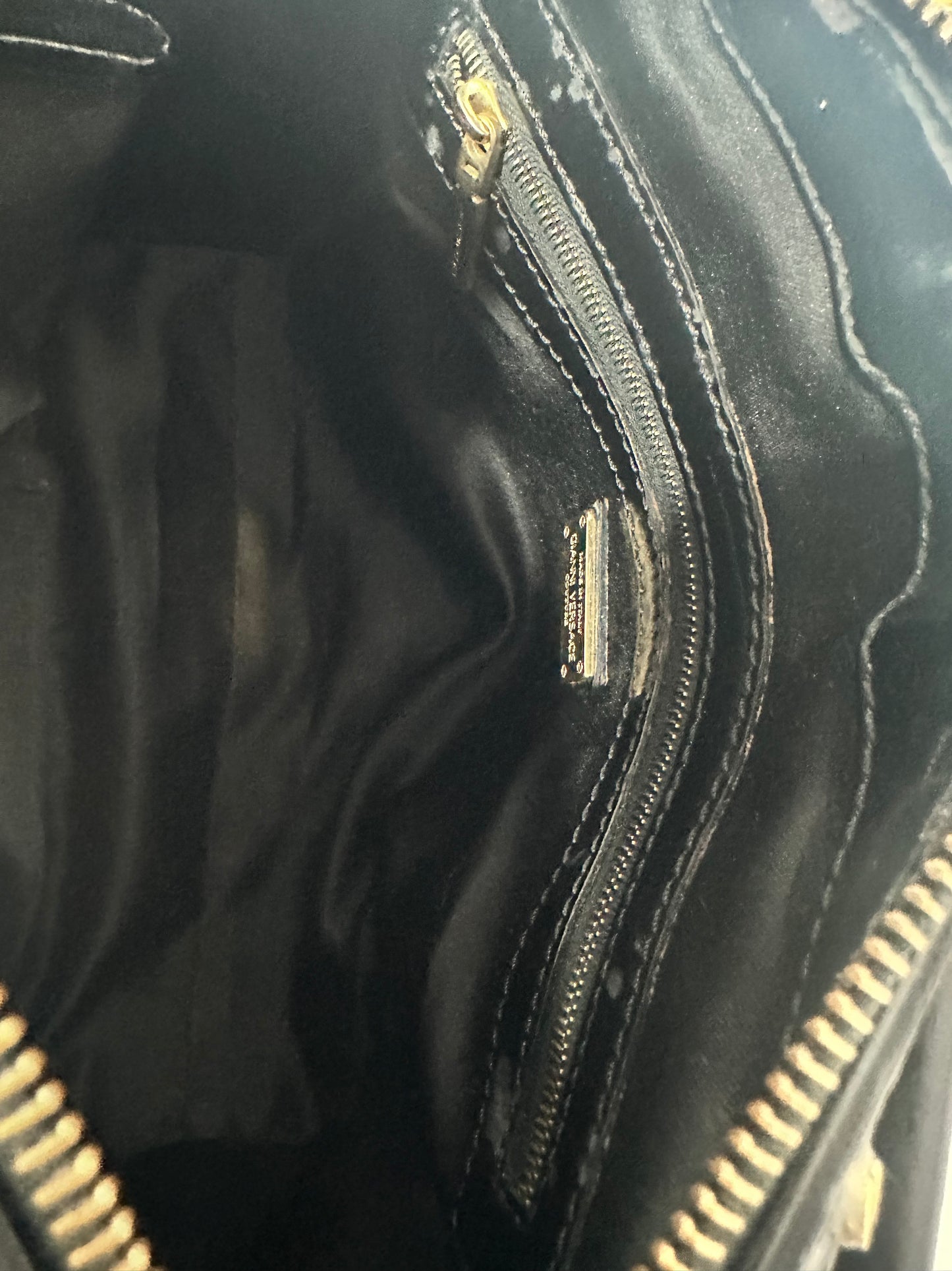 Versace
Black Quilted 'Snap Out Of It' Satchel