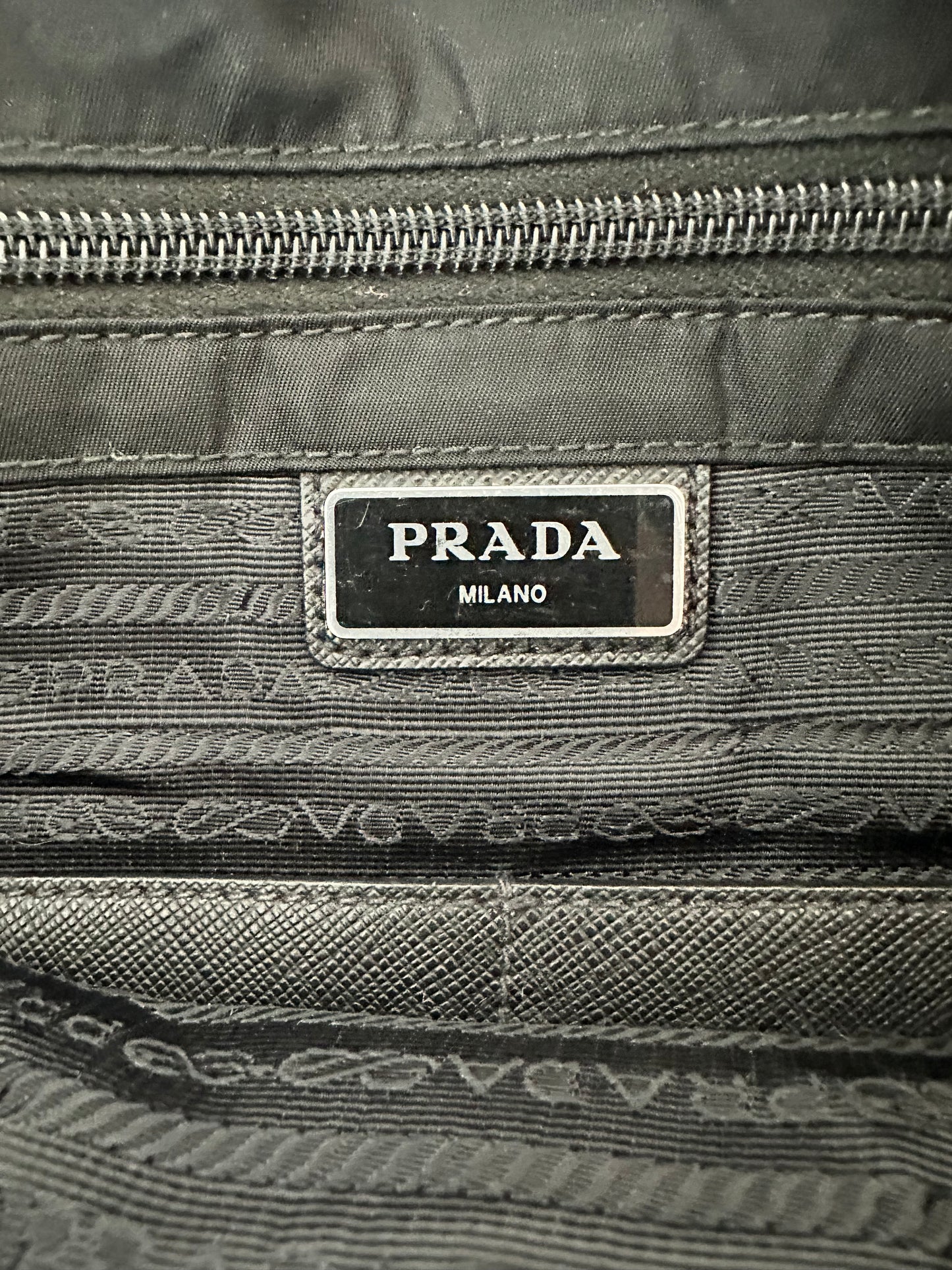 PRADA
Black Quilted Tessuto Nylon And Leather Messenger Bag