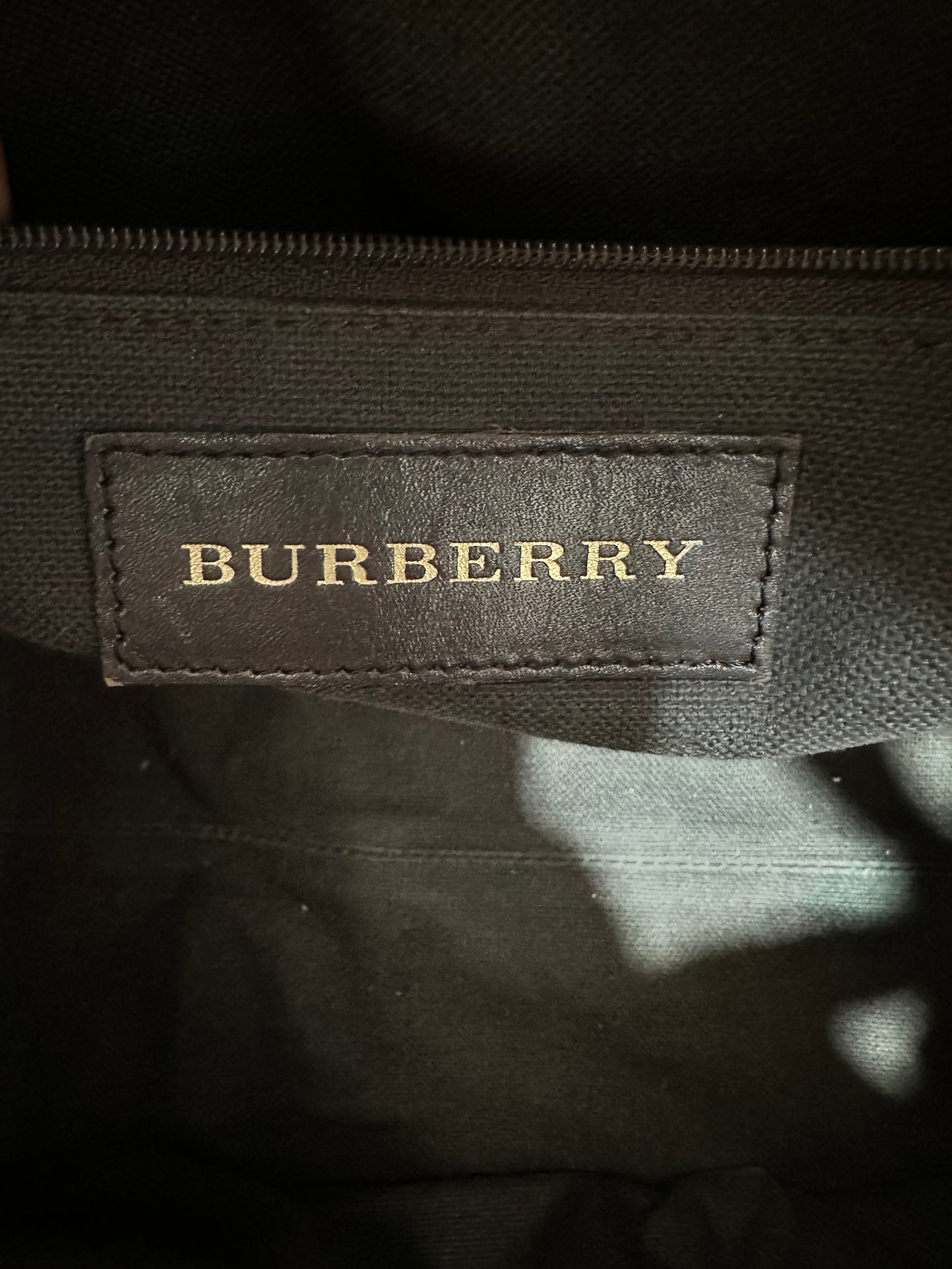 BURBERRY
Chocolate Leather Haymarket Check Coated Canvas Gladstone Bag