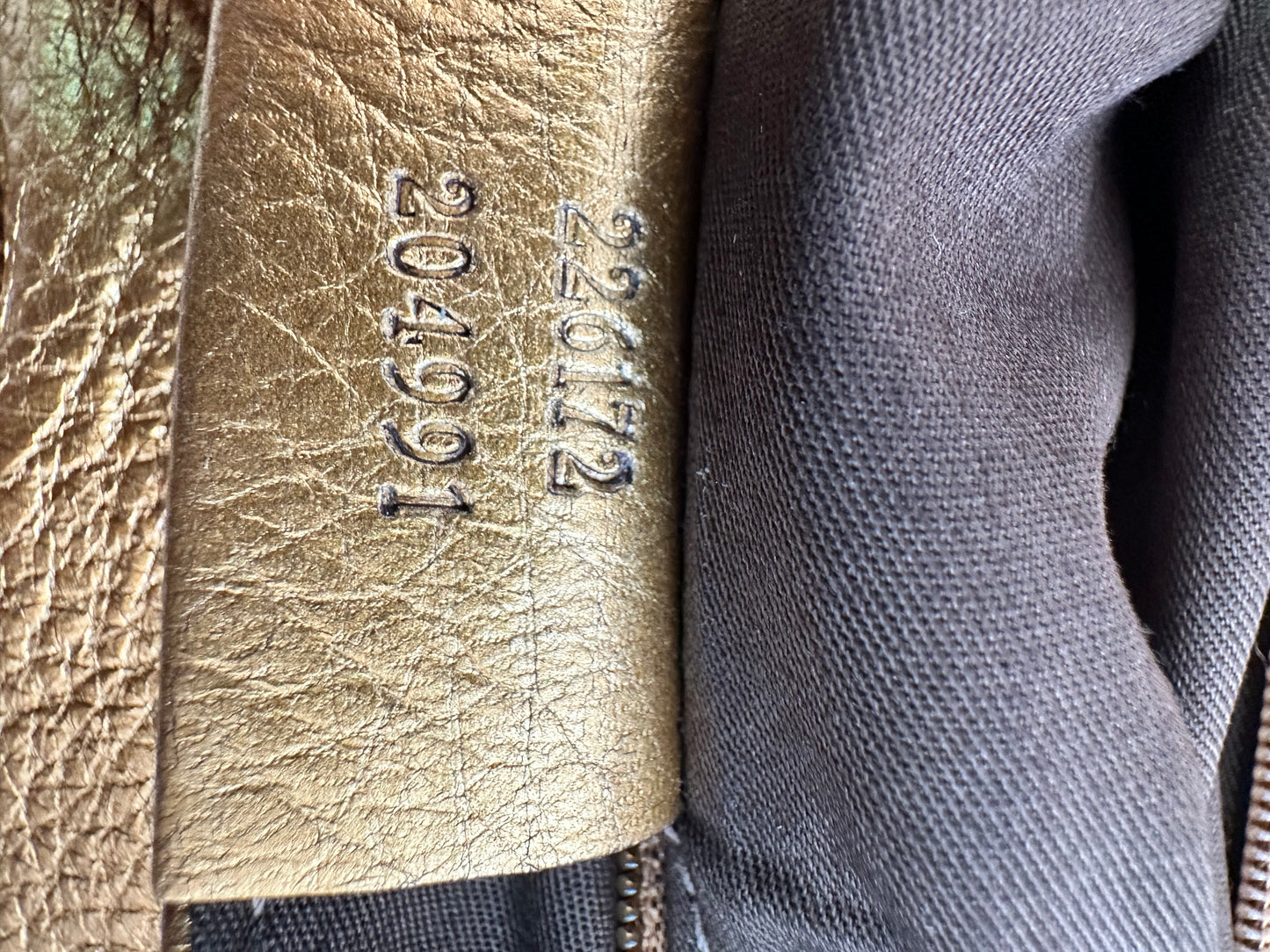 ALEXANDER MCQUEEN
Leather Faithful Glove Clutch