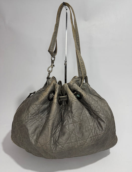 CHRISTIAN DIOR
Silver Cannage Quilted Leather Drawstring Tote Bag