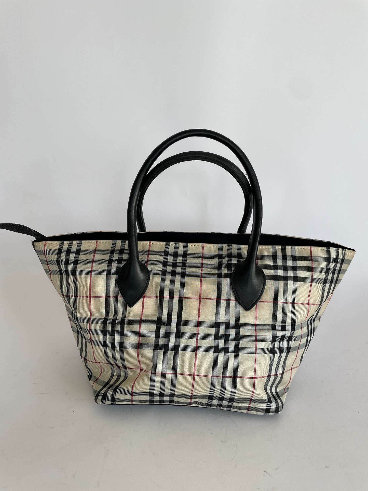 Burberry Pre-Owned
2000s House Check small zipped handbag