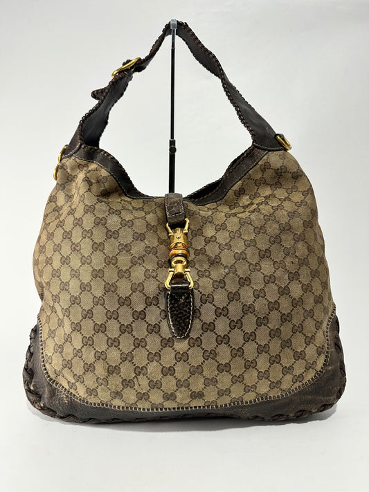 GUCCI
Beige/Ebony GG Coated Canvas New Jackie Large Shoulder Bag