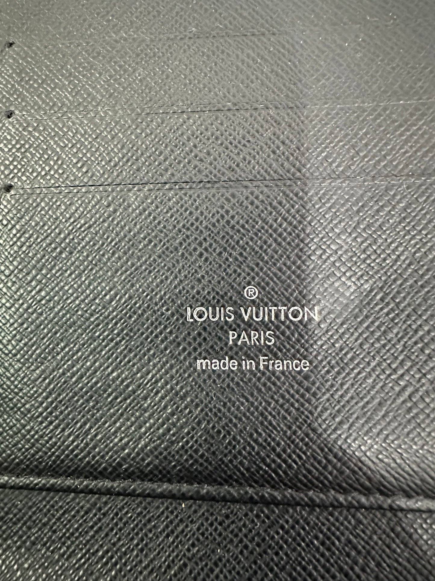 LOUIS VUITTON
Taiga Zippy XL Wallet Black