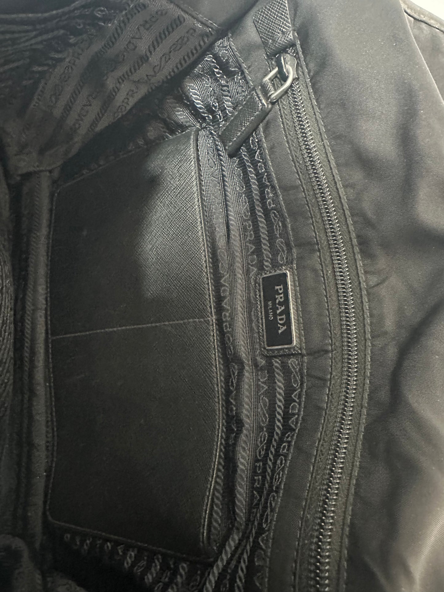 PRADA
Black Quilted Tessuto Nylon And Leather Messenger Bag