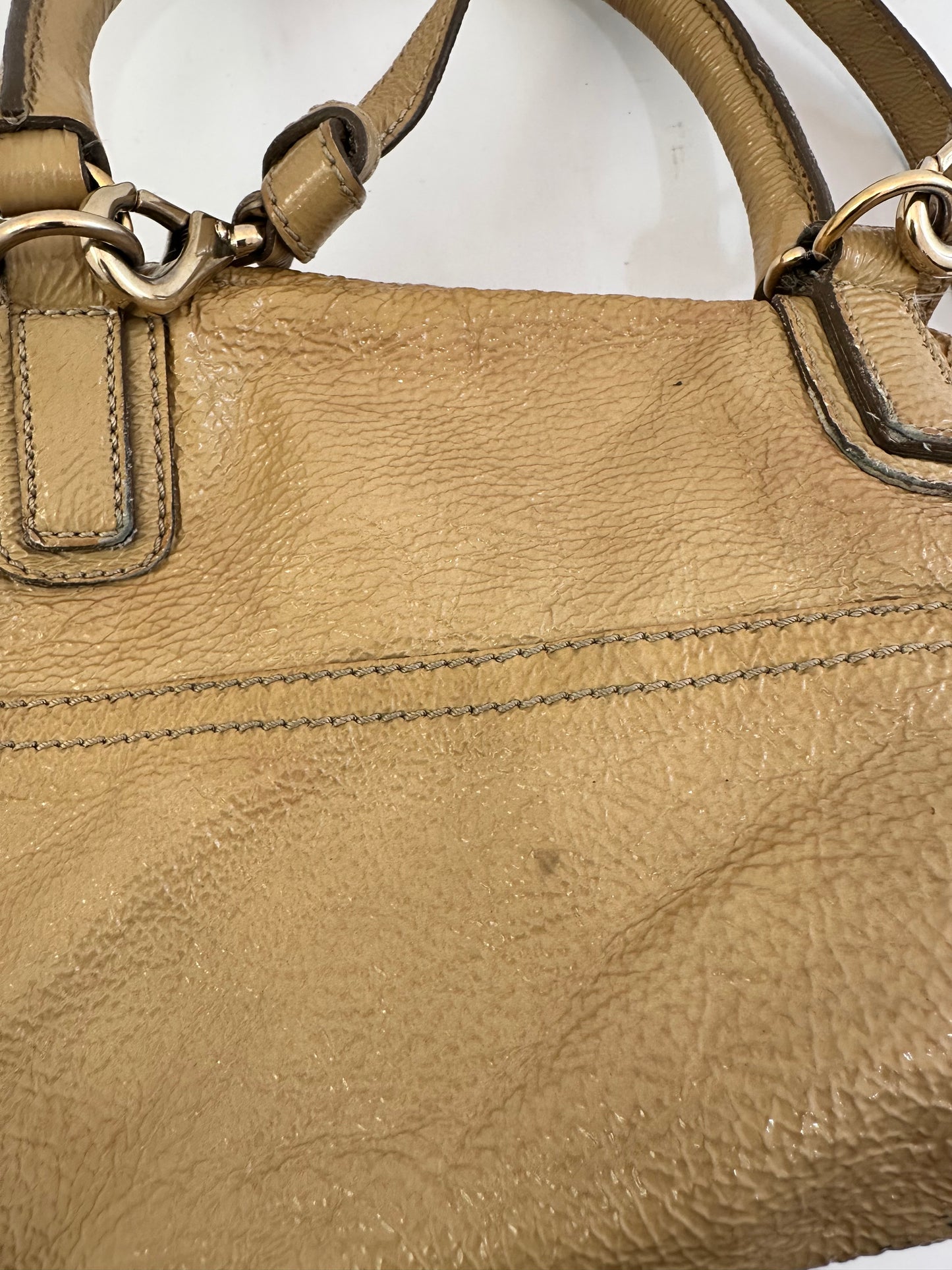 GIVENCHY
Beige Distressed Patent Leather Pandora Mini Messenger Bag