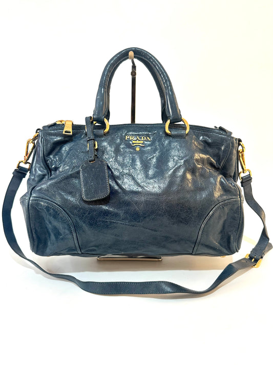 PRADA
Denim Blue Vitello Shine Leather Bauletto Bag