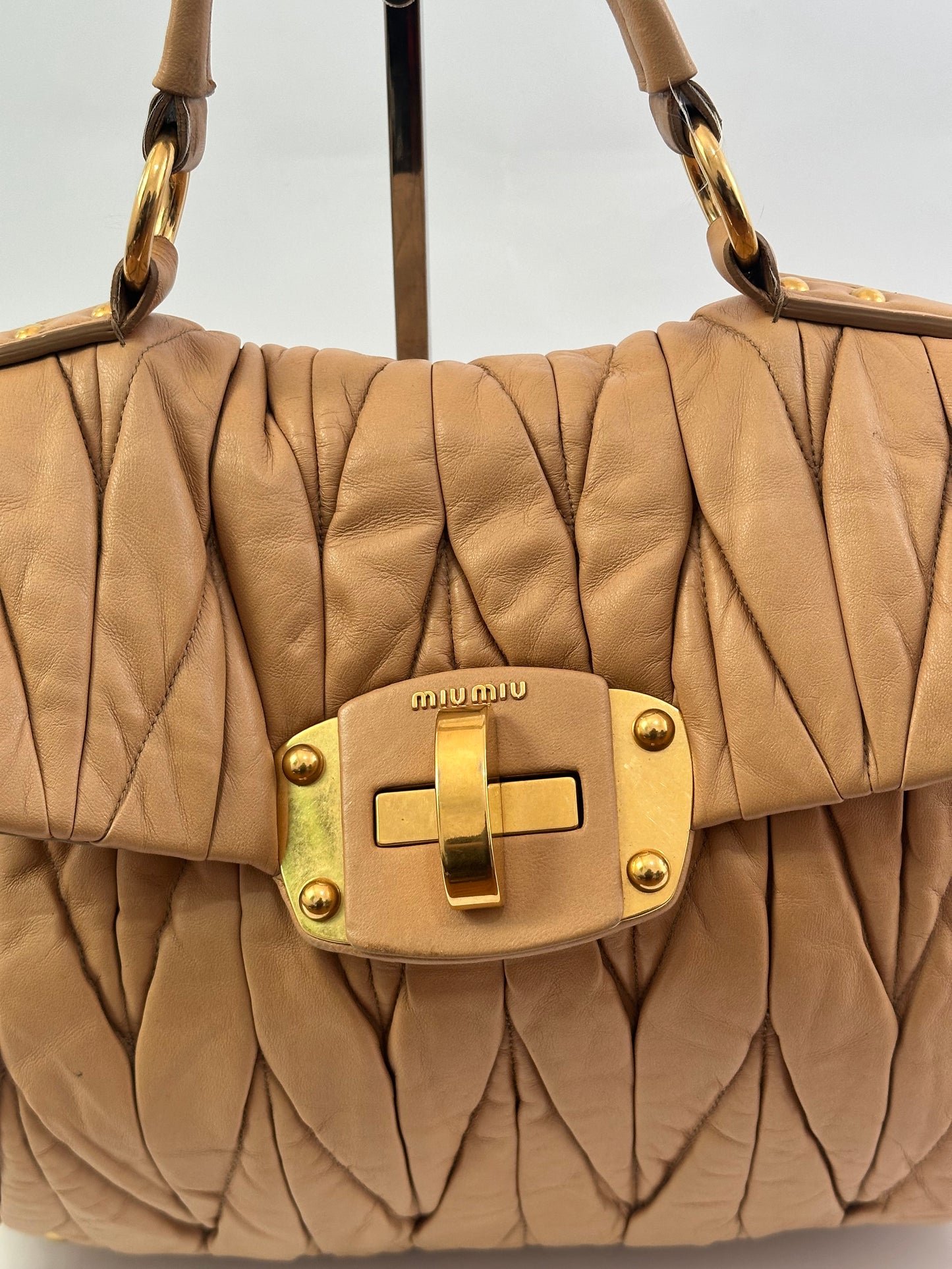 Miu Miu Beige Matelasse Leather Turnlock Top Handle Bag
