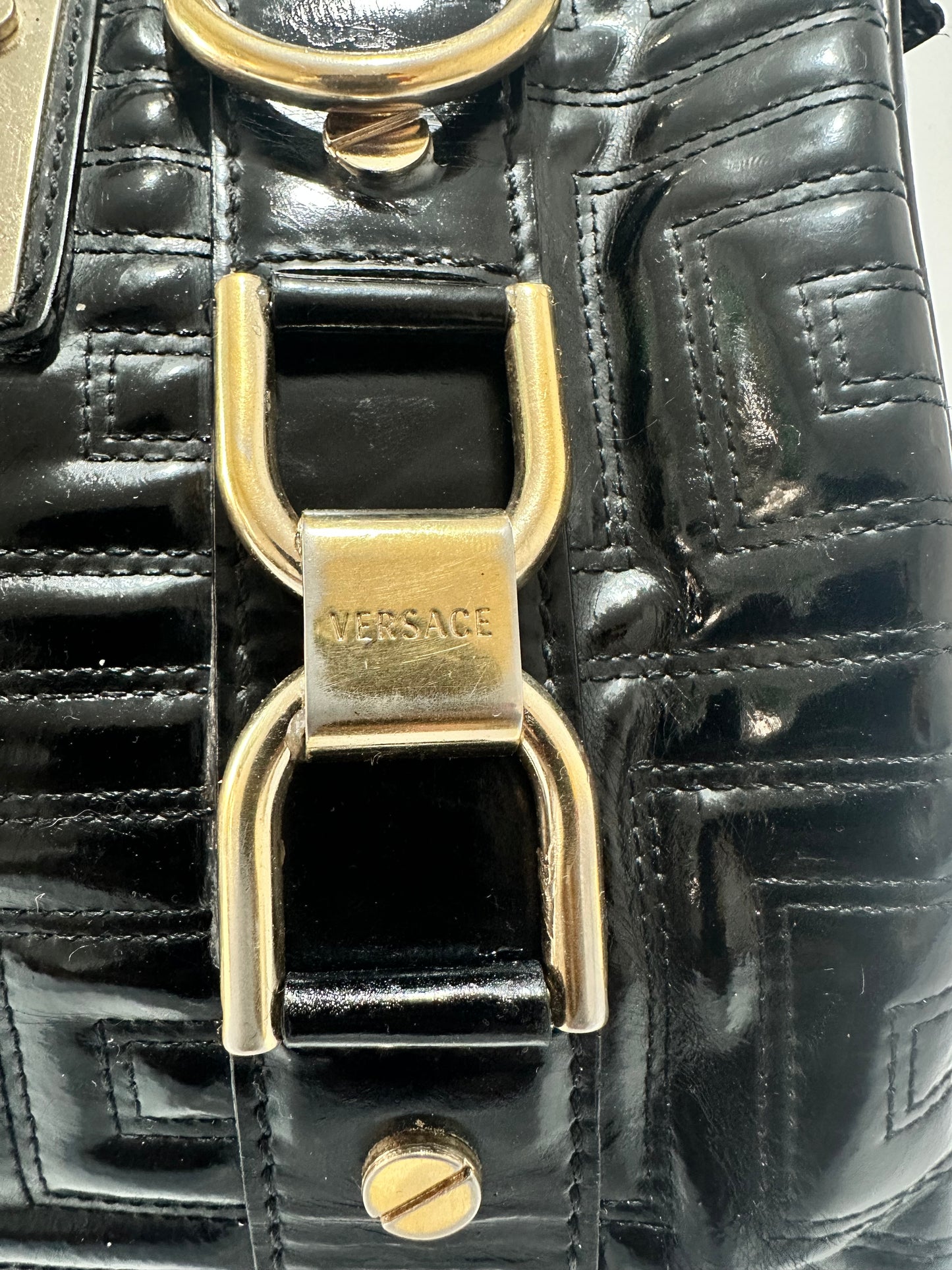 Versace
Black Quilted 'Snap Out Of It' Satchel