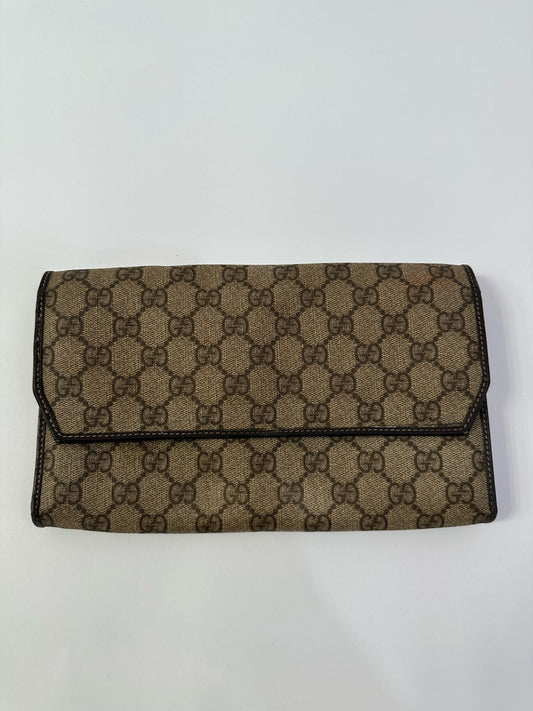 GUCCI
GG Supreme Monogram Clutch Document Holder Brown