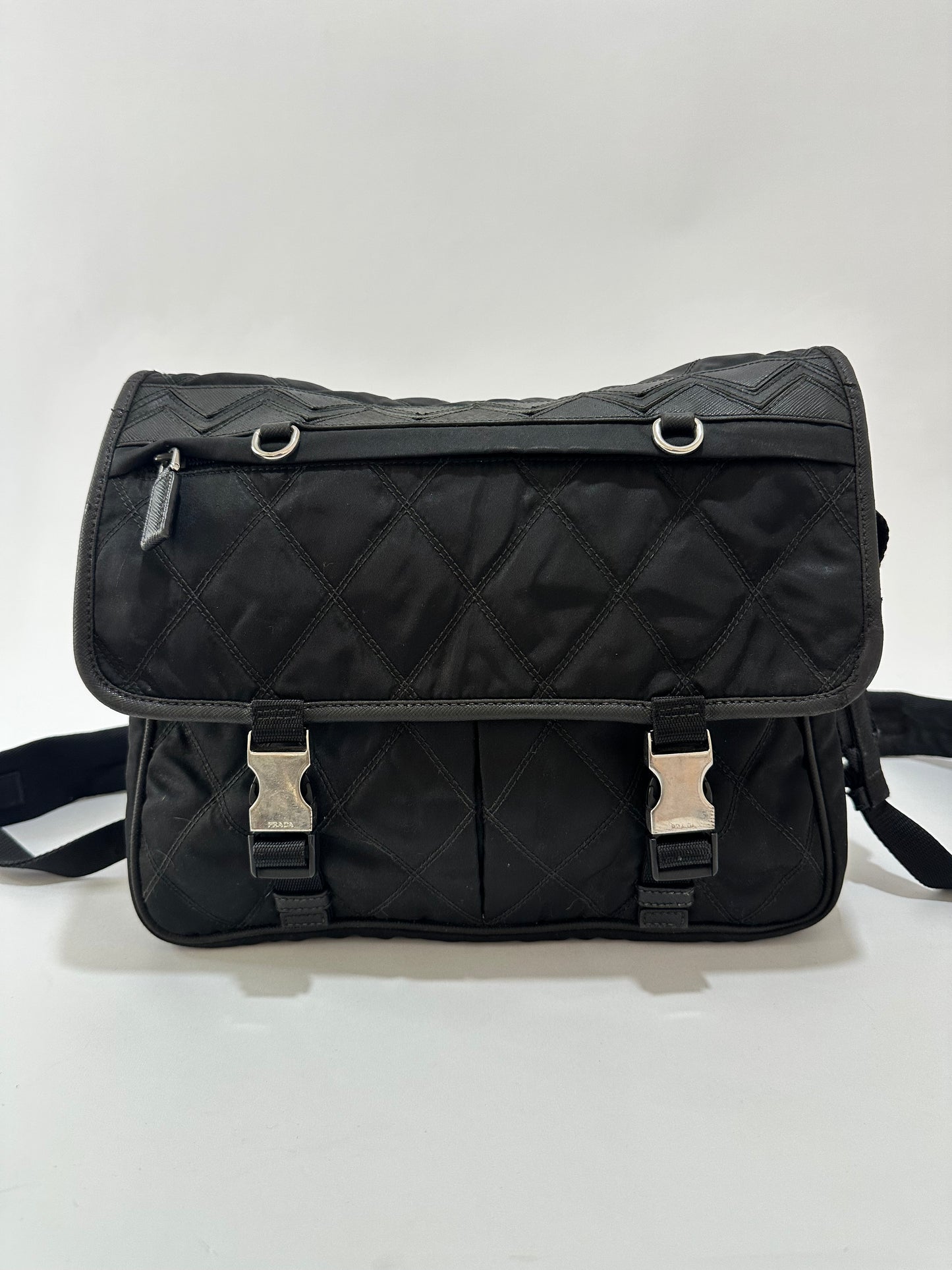 PRADA
Black Quilted Tessuto Nylon And Leather Messenger Bag
