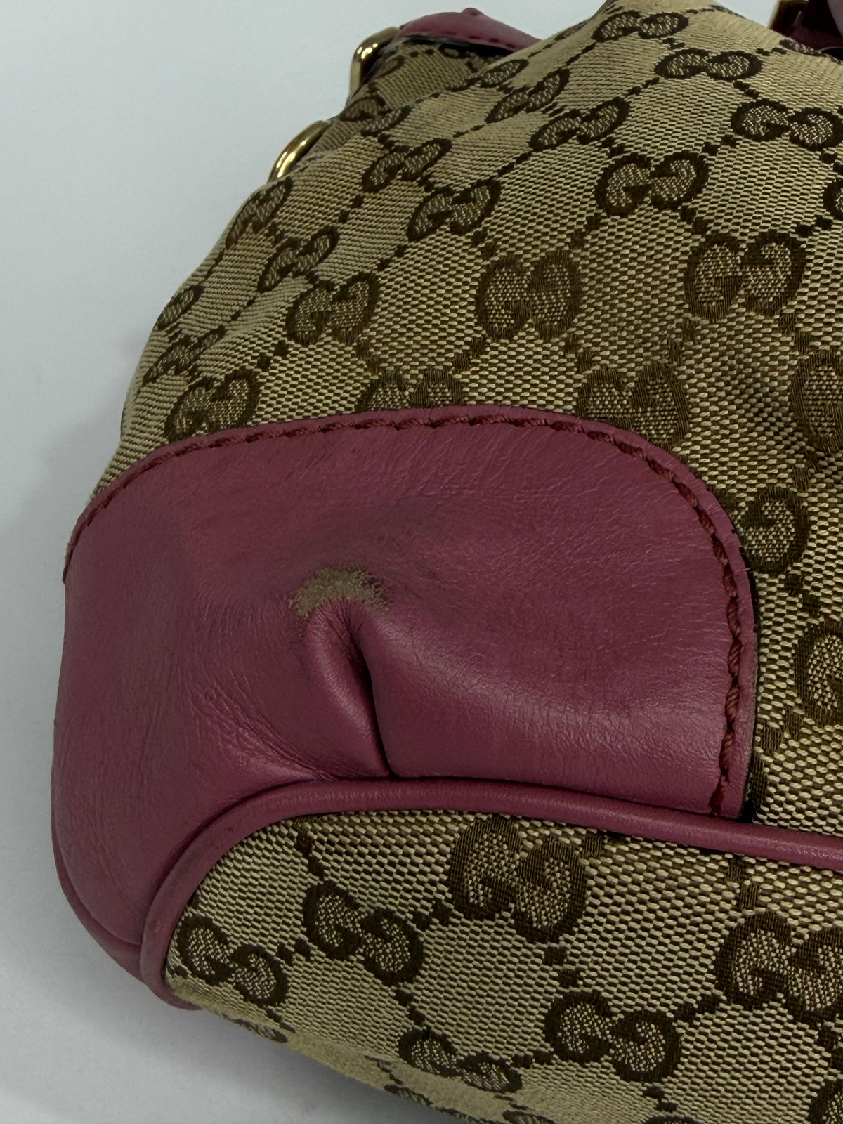 Gucci
GG Canvas and Leather Sukey Bag