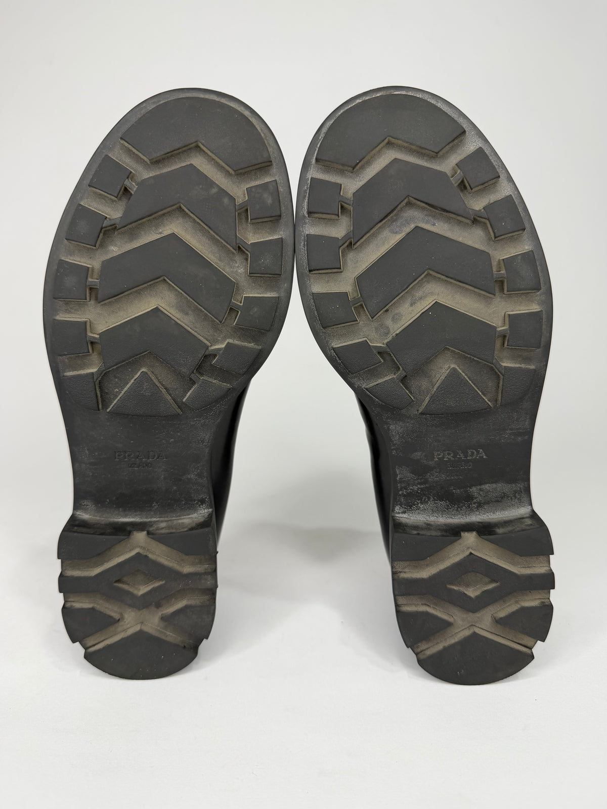Prada
Enameled Metal Triangle Leather Loafers
Women's Size 38 EU/ 8 US