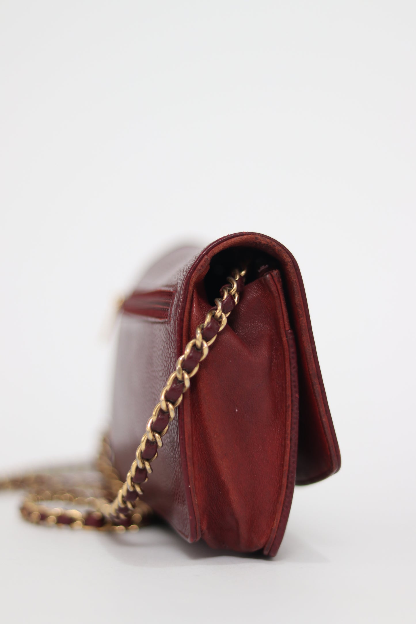 CHANEL
Burgundy Timeless Caviar Wallet-Clutch Bag
