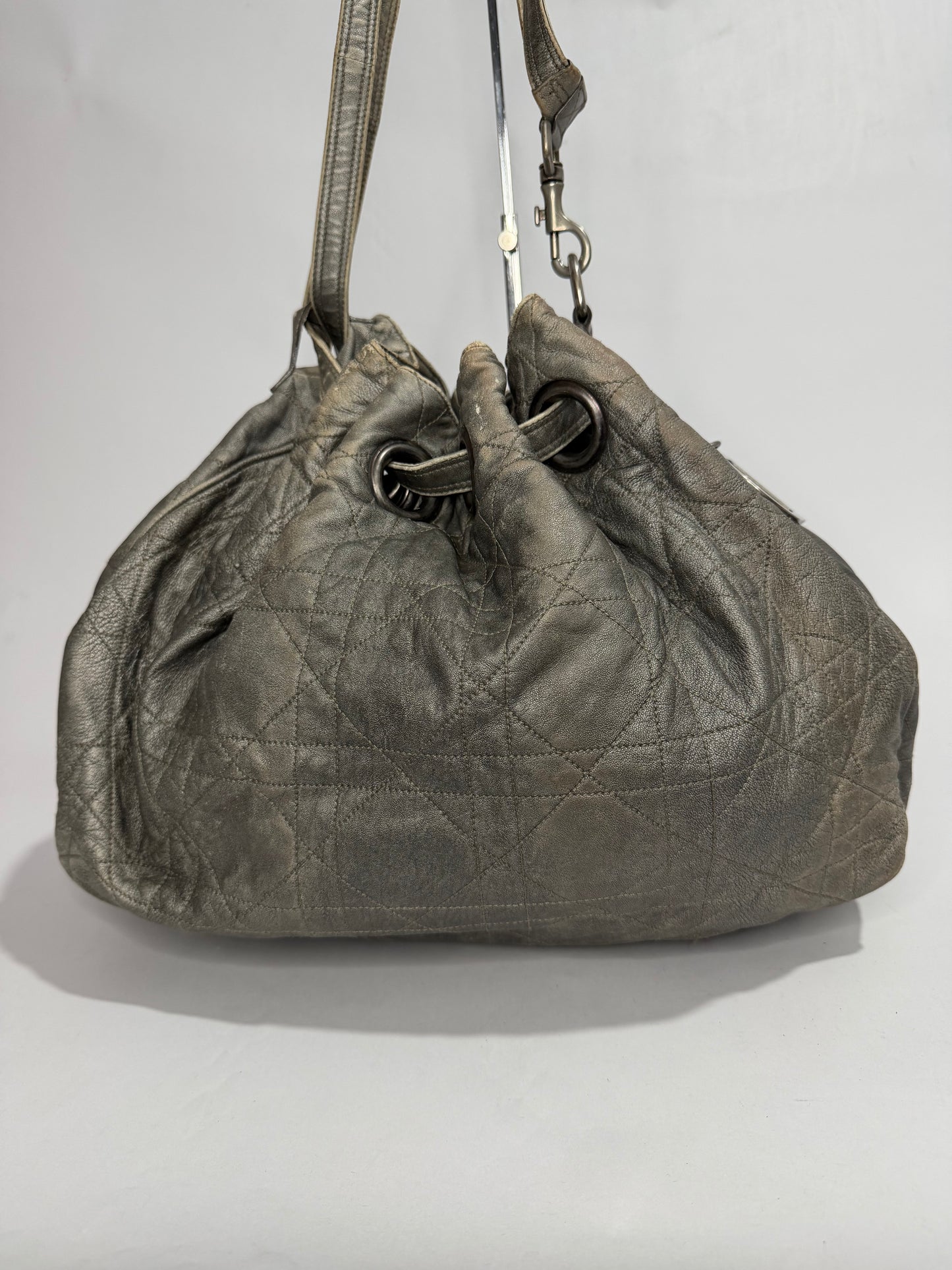 CHRISTIAN DIOR
Silver Cannage Quilted Leather Drawstring Tote Bag