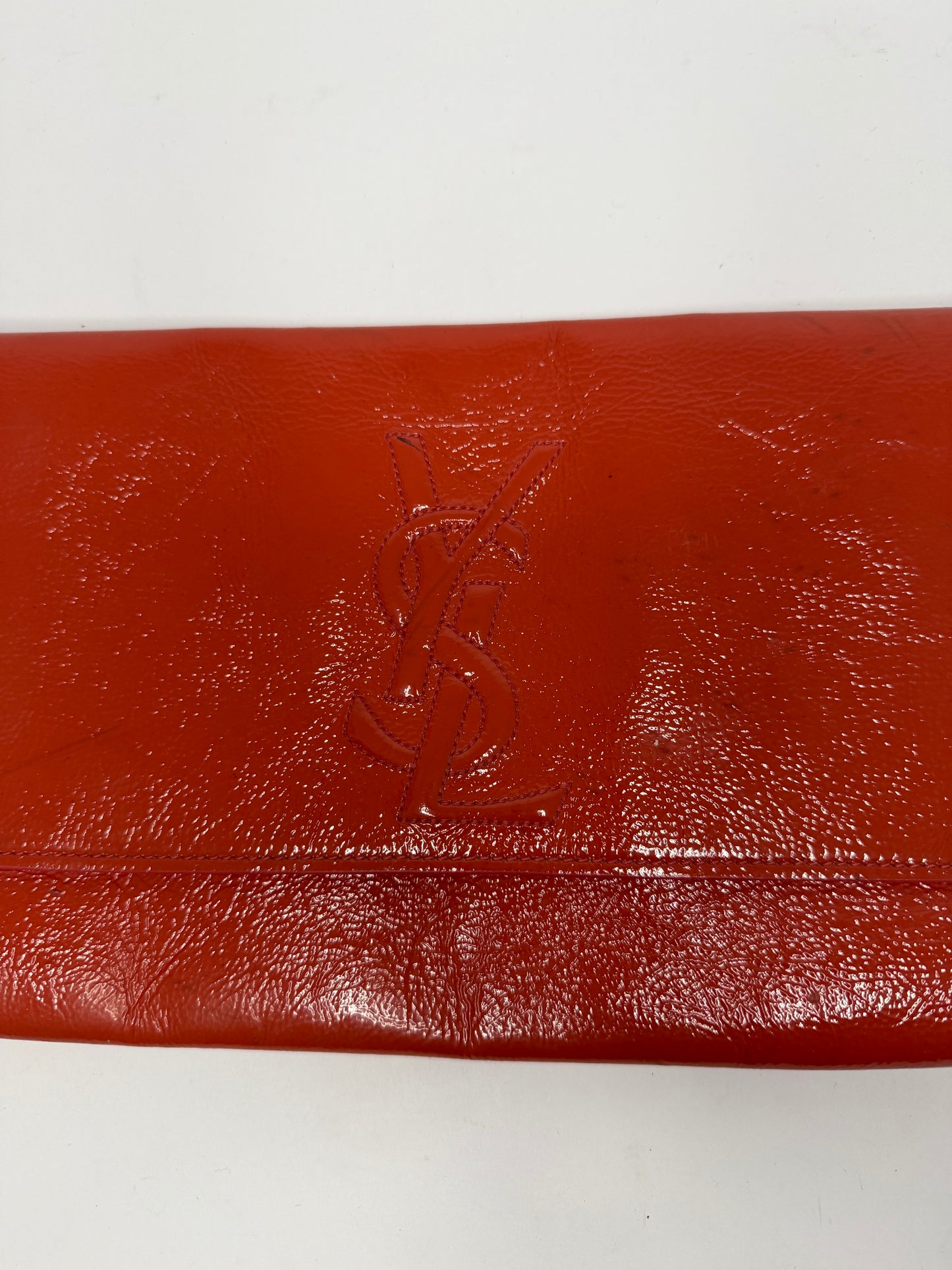 YVES SAINT LAURENT
Dark Orange Patent Leather Belle De Jour Large Clutch Bag