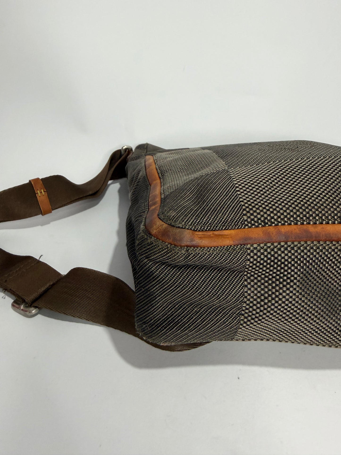 LOUIS VUITTON
Terre Damier Geant Vertical Messenger Bag