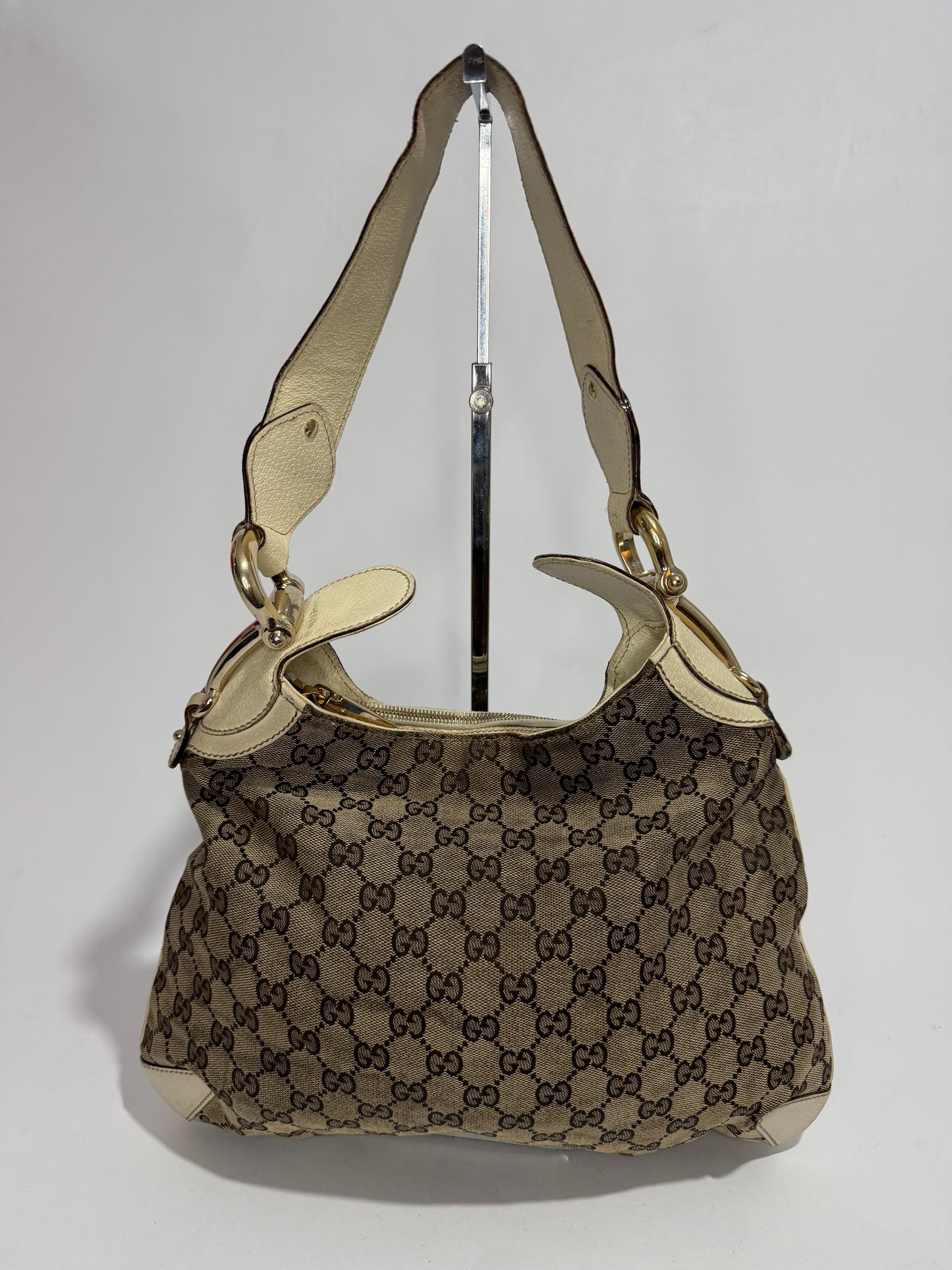 GUCCI
Beige/White GG Canvas Horsebit Creole Hobo Bag