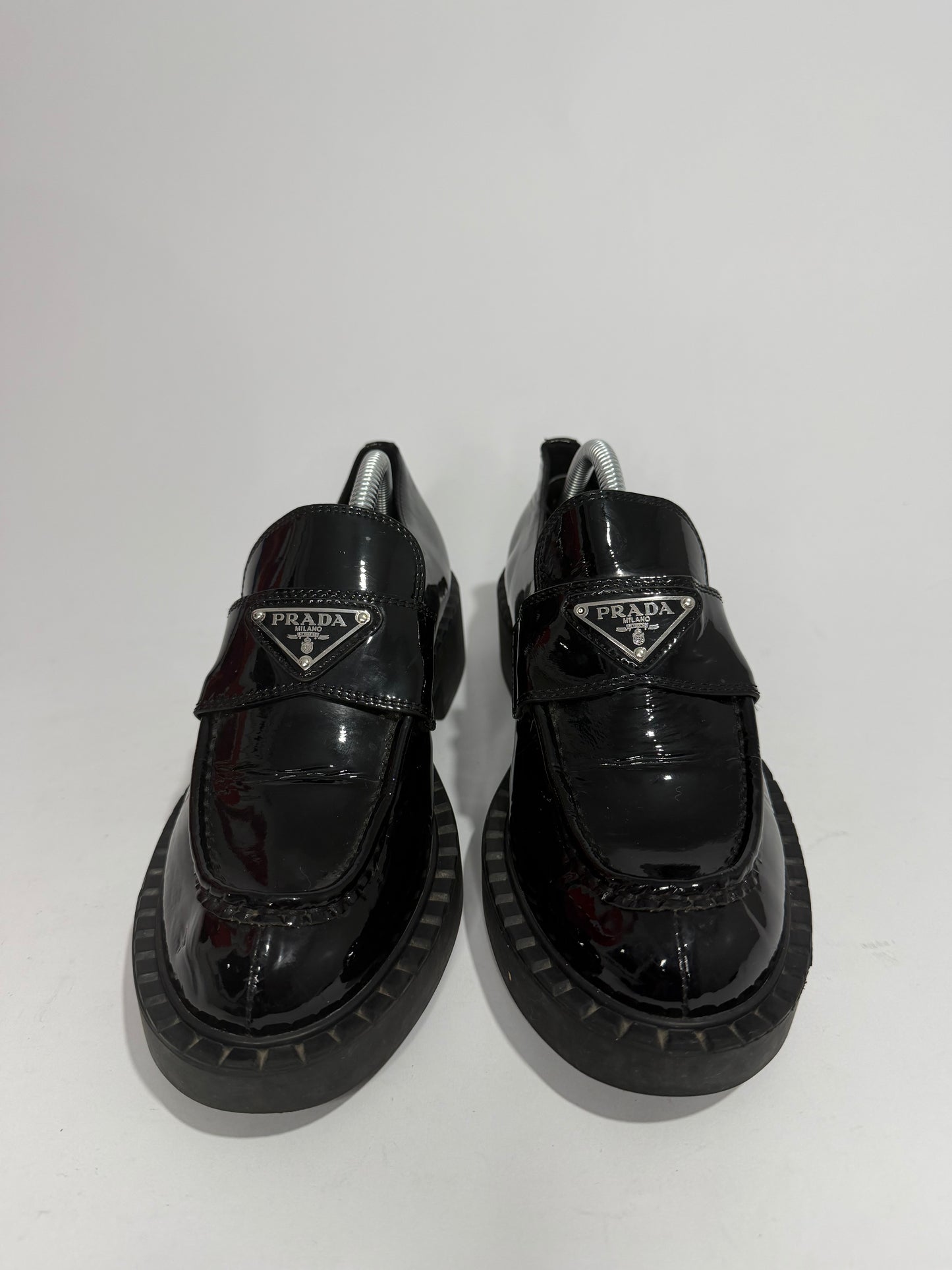 PRADA
Vernice Metal Triangle Logo 50mm Loafers Size 37 EU/7 US/ 4 UK