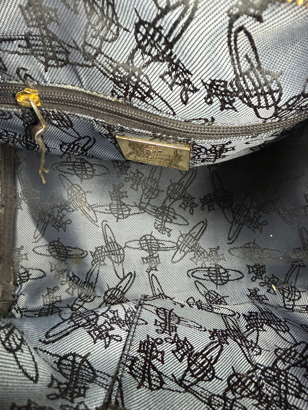 Vivienne Westwood
Leather Trim Coated Canvas Handle Bag