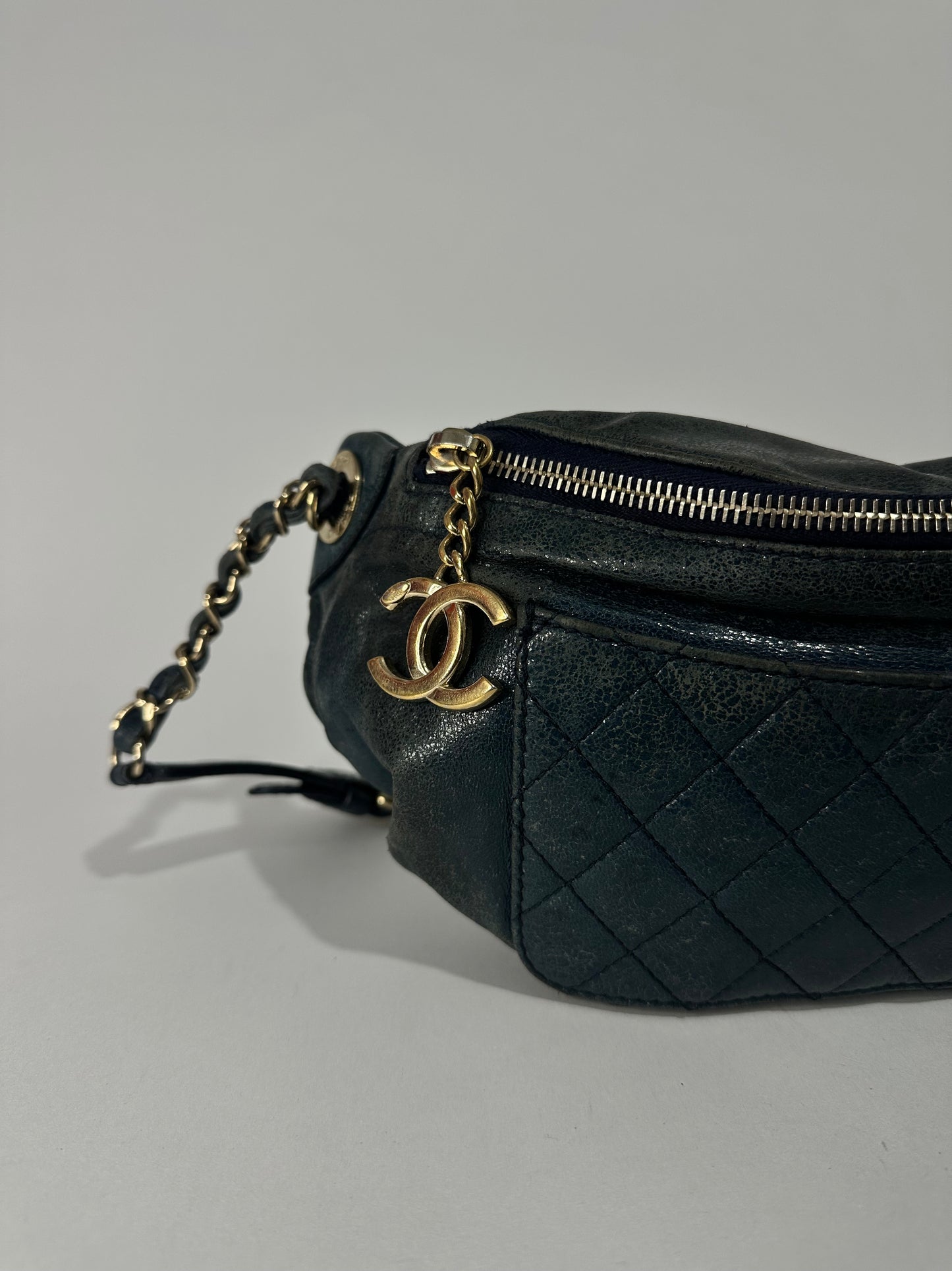CHANEL
Blue Quilted Caviar Leather Waist Belt Bag