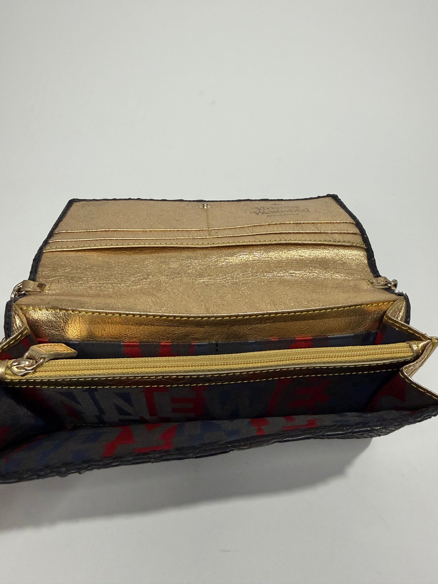 VIVIENNE WESTWOOD
Frilly Snake Patent Wallet In Black