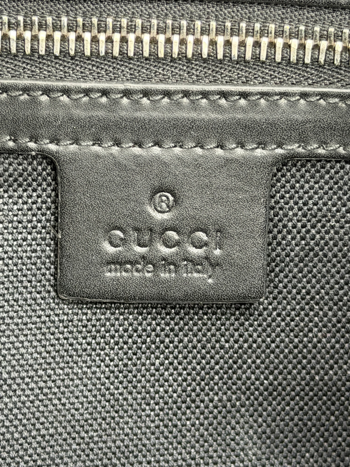 GUCCI
GG Supreme Clutch Bag