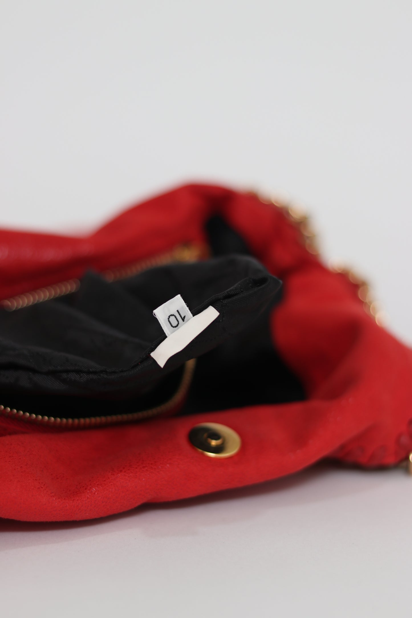 STELLA MCCARTNEY
Red Shaggy Deer Faux-Leather Falabella Fold Over Tote Bag