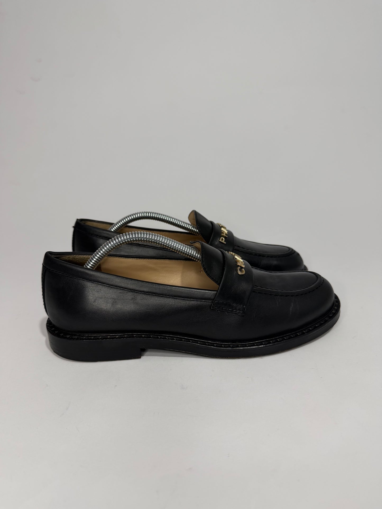 CHANEL x Pharrell Black Leather Logo Loafers Gold Hardware EU 38C