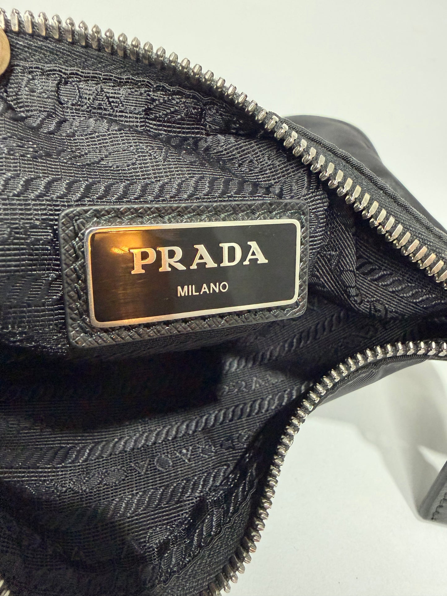 Certified Authentic
PRADA
Re-Nylon Saffiano Re-Edition 2000 Double Zip Crossbody Bag Black