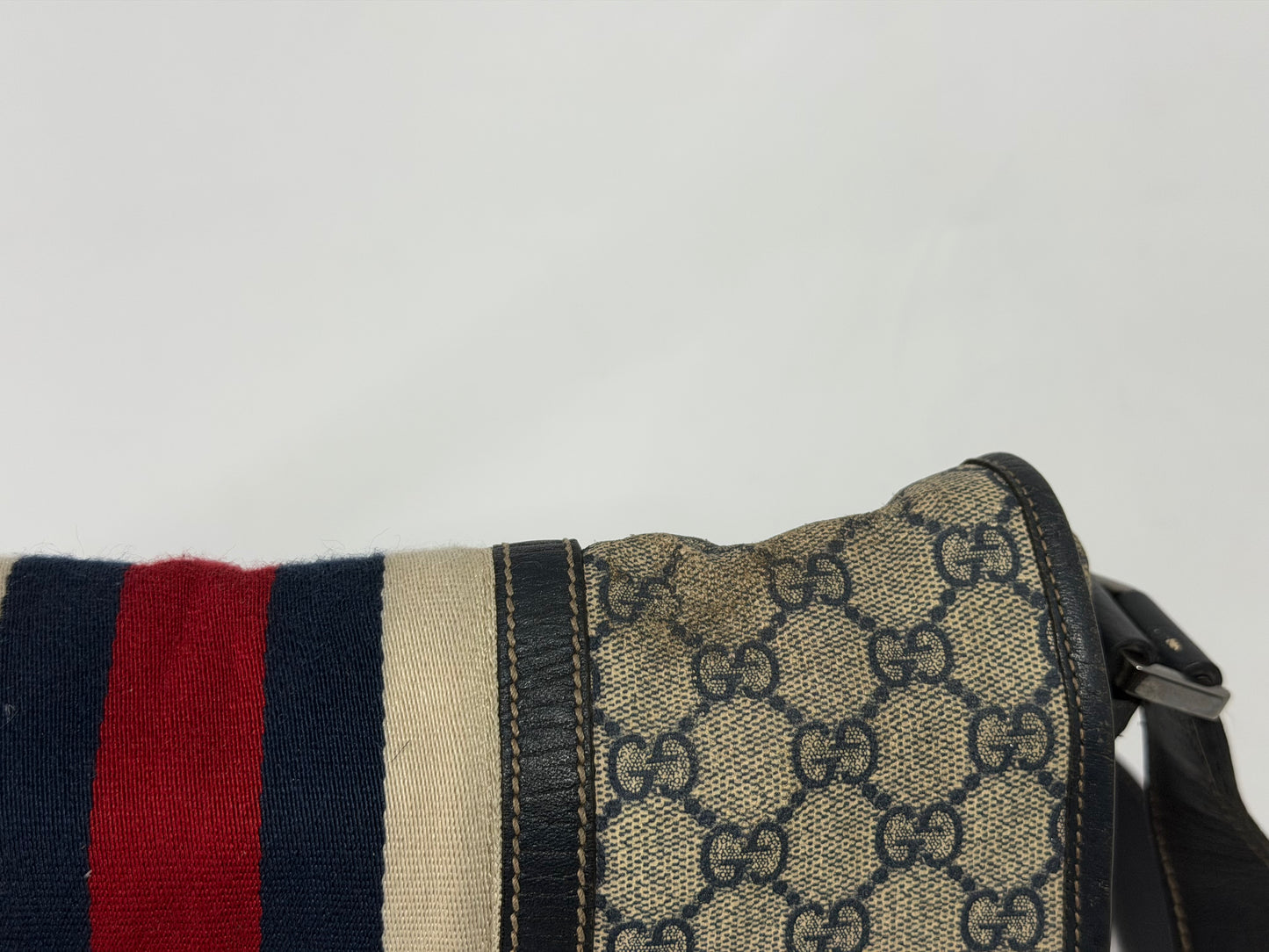 GUCCI
Blue GG Coated Canvas Vintage Web Messenger Bag