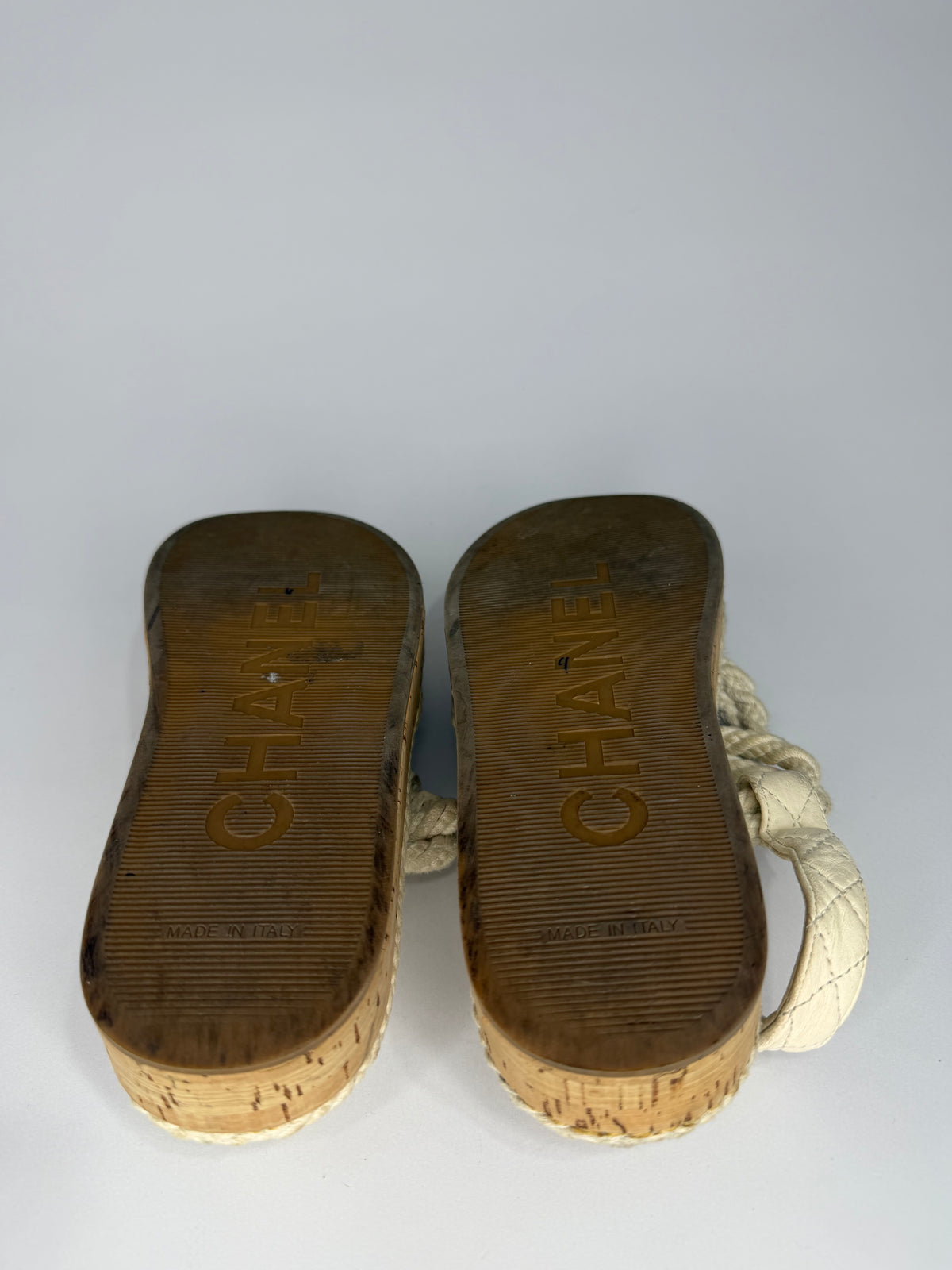 CHANEL
Cord Lambskin Quilted Logo Sandals White Size 37 EU/ 4 UK/ 7 US