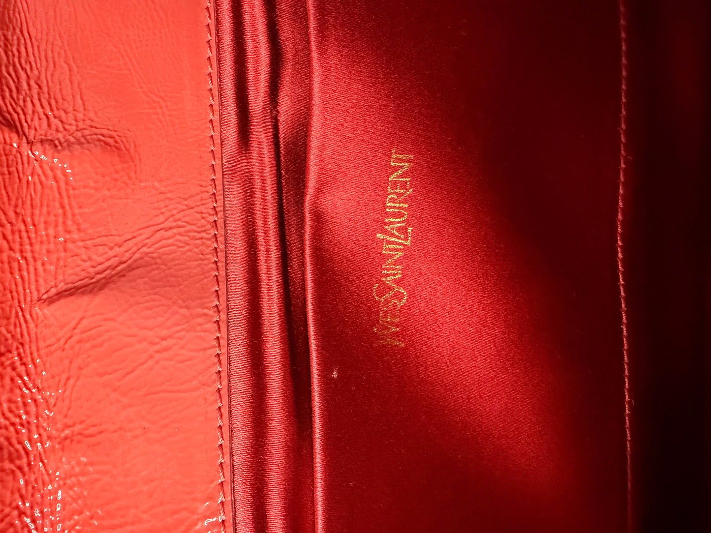 YVES SAINT LAURENT
Dark Orange Patent Leather Belle De Jour Large Clutch Bag