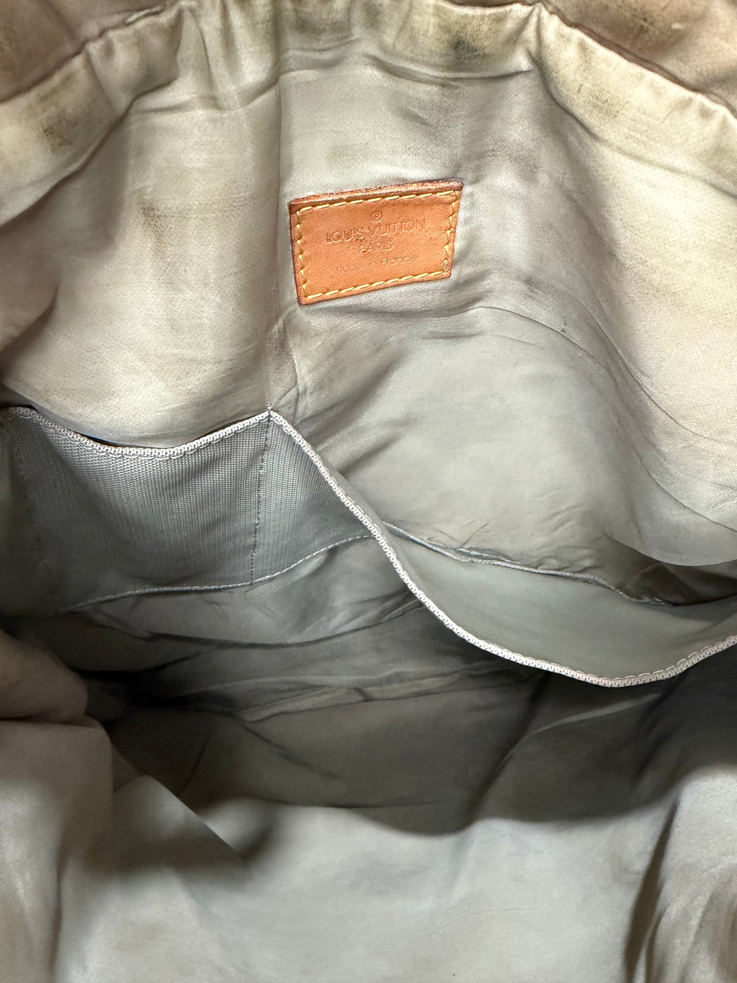 LOUIS VUITTON
Terre Damier Geant Vertical Messenger Bag