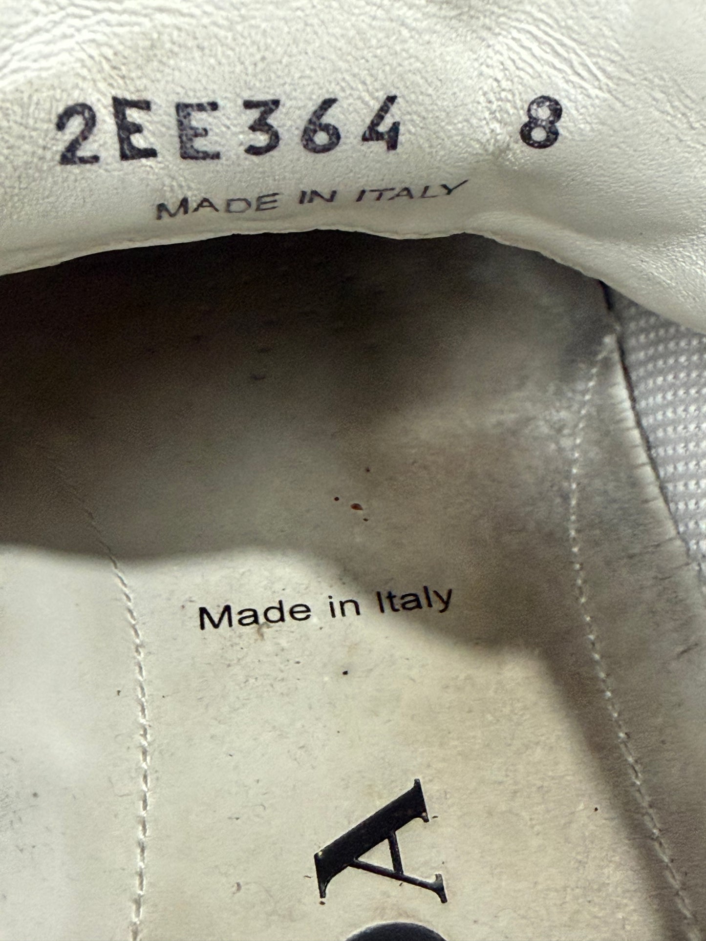 Prada
Enameled Metal Triangle Leather Sneakers