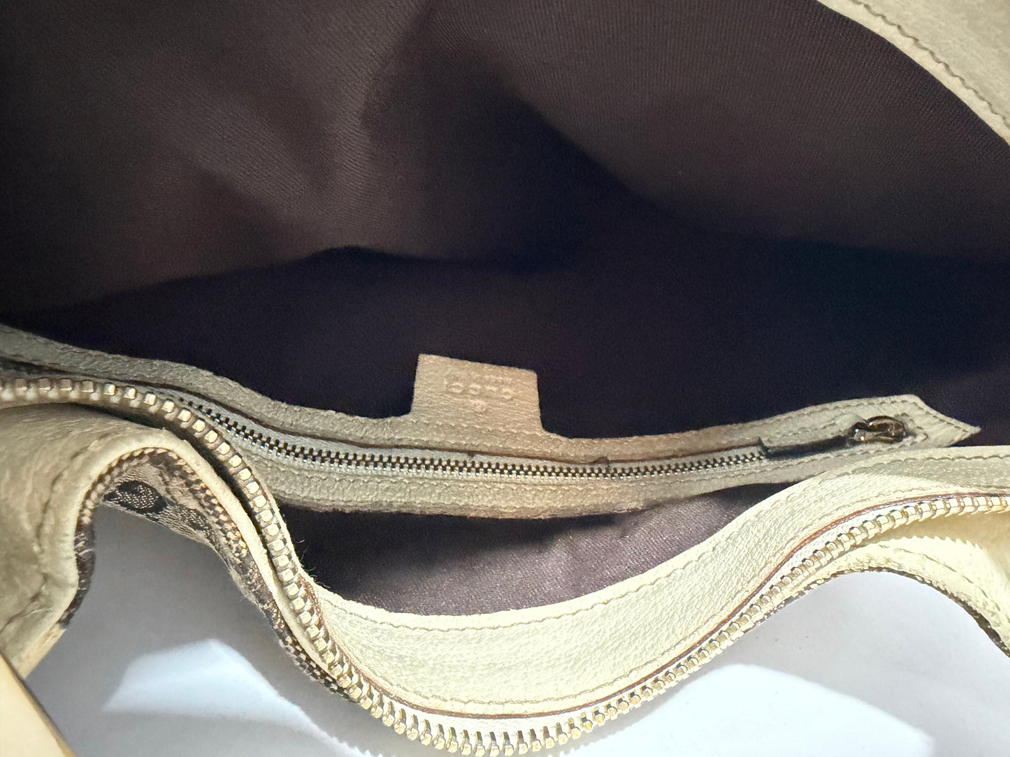 GUCCI
Beige/White GG Canvas Horsebit Creole Hobo Bag