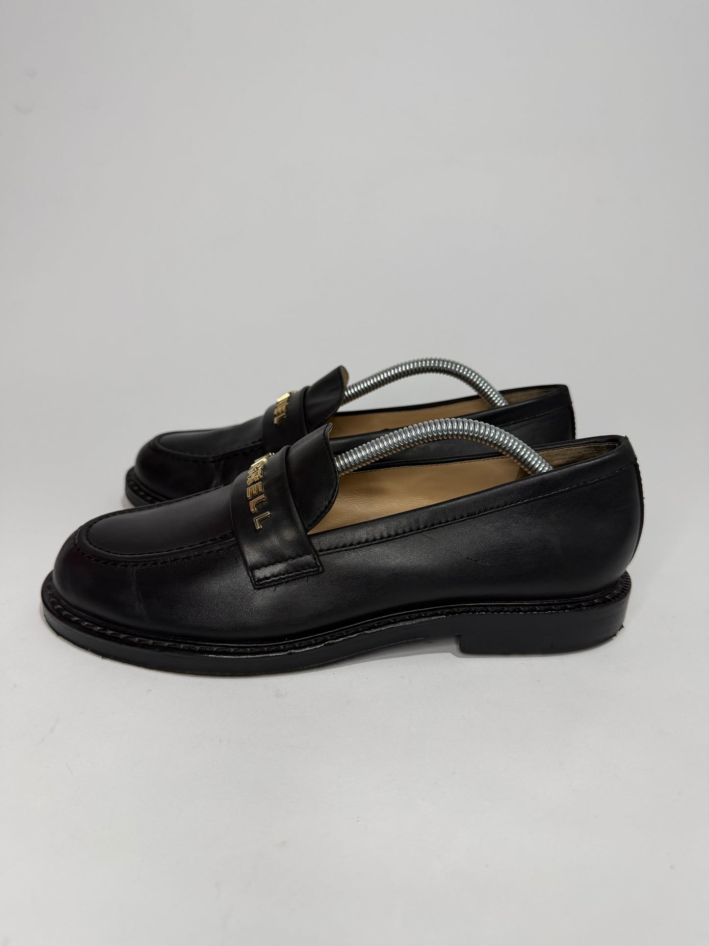 CHANEL x Pharrell Black Leather Logo Loafers Gold Hardware EU 38C