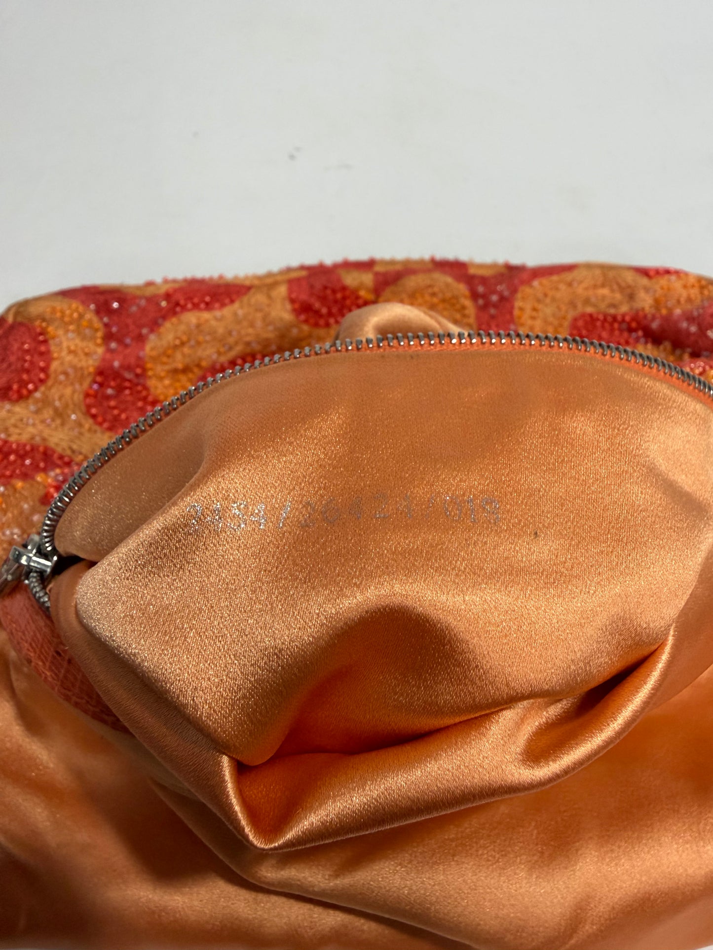 FENDI BEADED SWIRL SHOULDER BAGUETTE BAG IN ORANGE