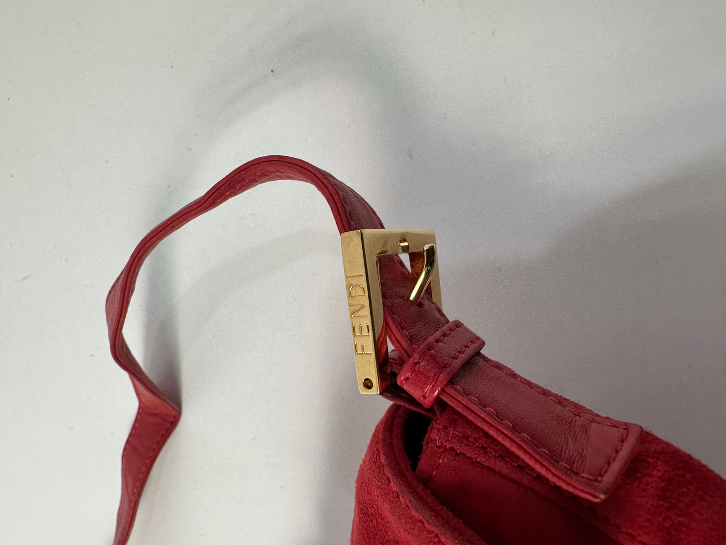 FENDI
Red Suede Baguette Bag