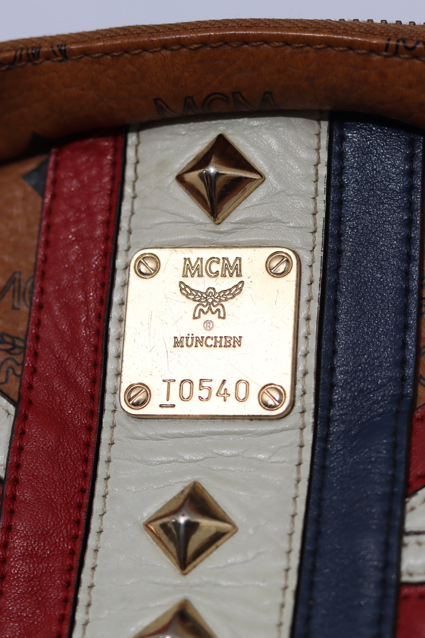 MCM 
Visetos Studded Medium Stark London Olympic Backpack Cognac
