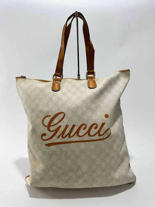 GUCCI 
GG Plus Monogram Flat Tote Yellow