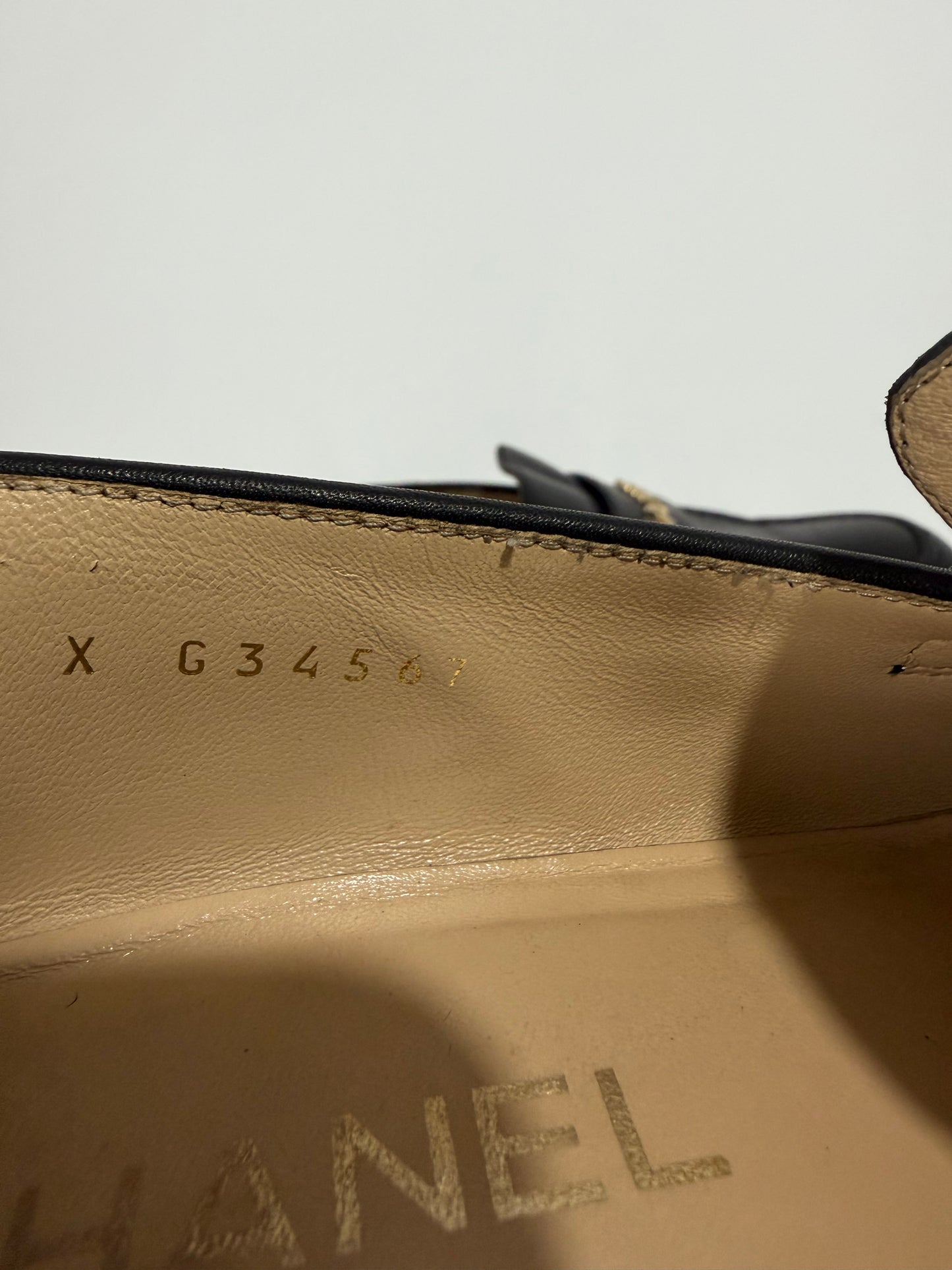 CHANEL x Pharrell Black Leather Logo Loafers Gold Hardware EU 38C